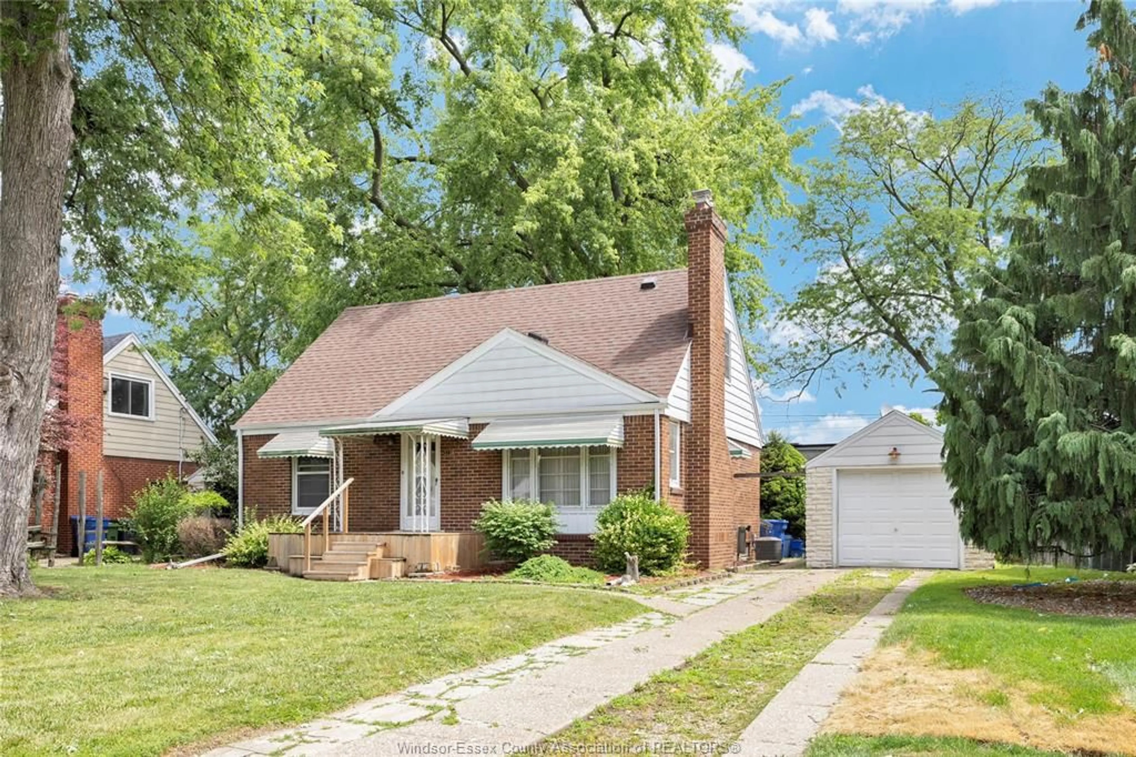Home with brick exterior material, street for 3138 Church, Windsor Ontario N9E 1V1