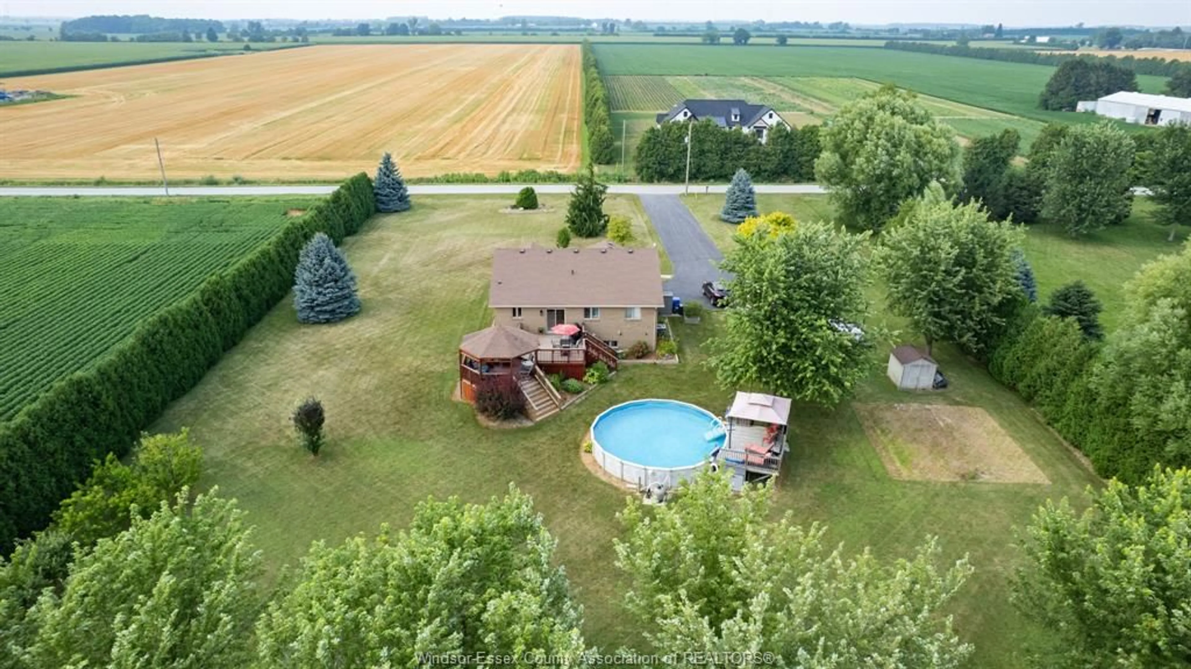 A pic from outside/outdoor area/front of a property/back of a property/a pic from drone, water/lake/river/ocean view for 7841 COLLISON Sideroad, Amherstburg Ontario N0R 1G0