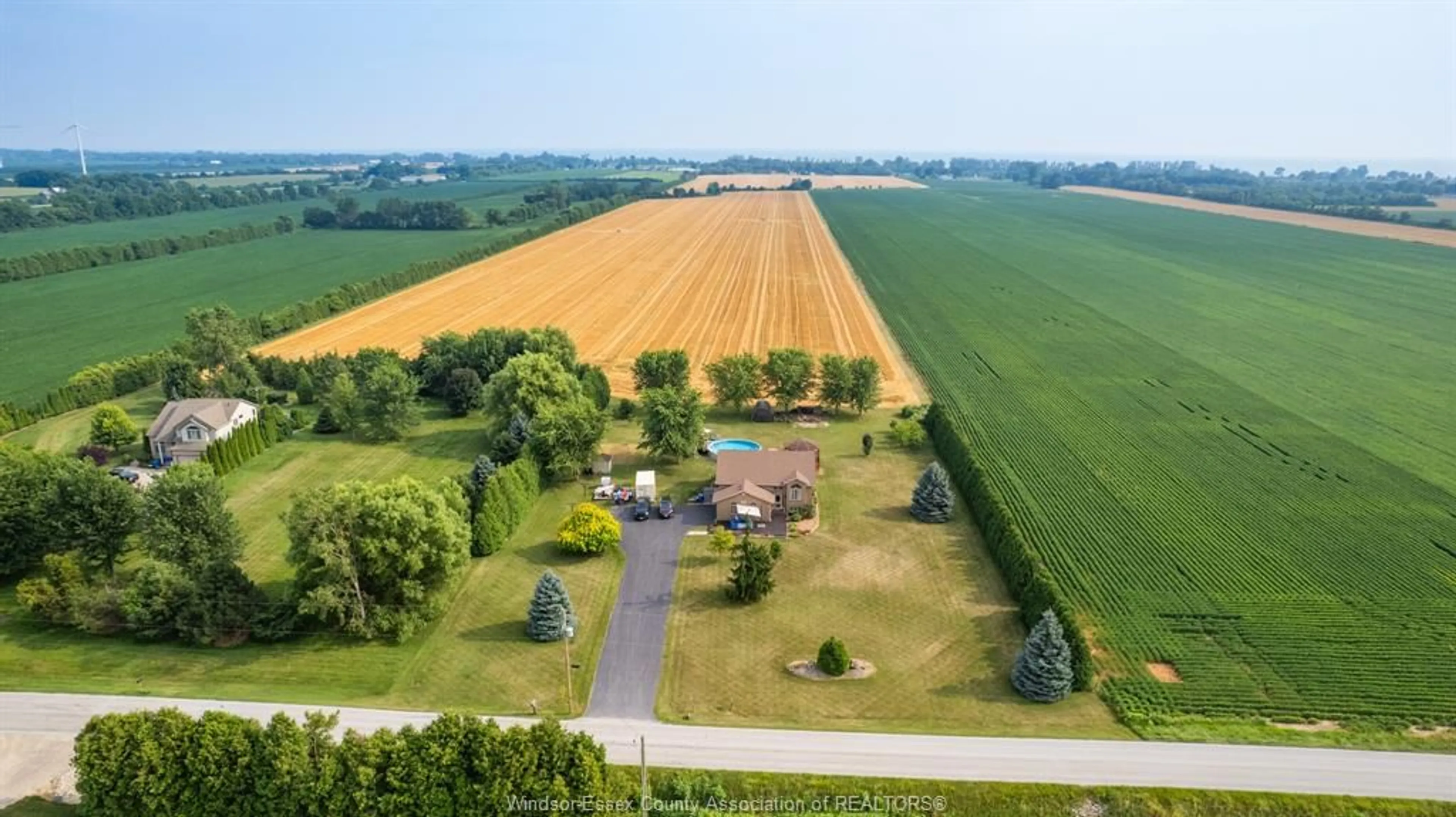 A pic from outside/outdoor area/front of a property/back of a property/a pic from drone, unknown for 7841 COLLISON Sideroad, Amherstburg Ontario N0R 1G0