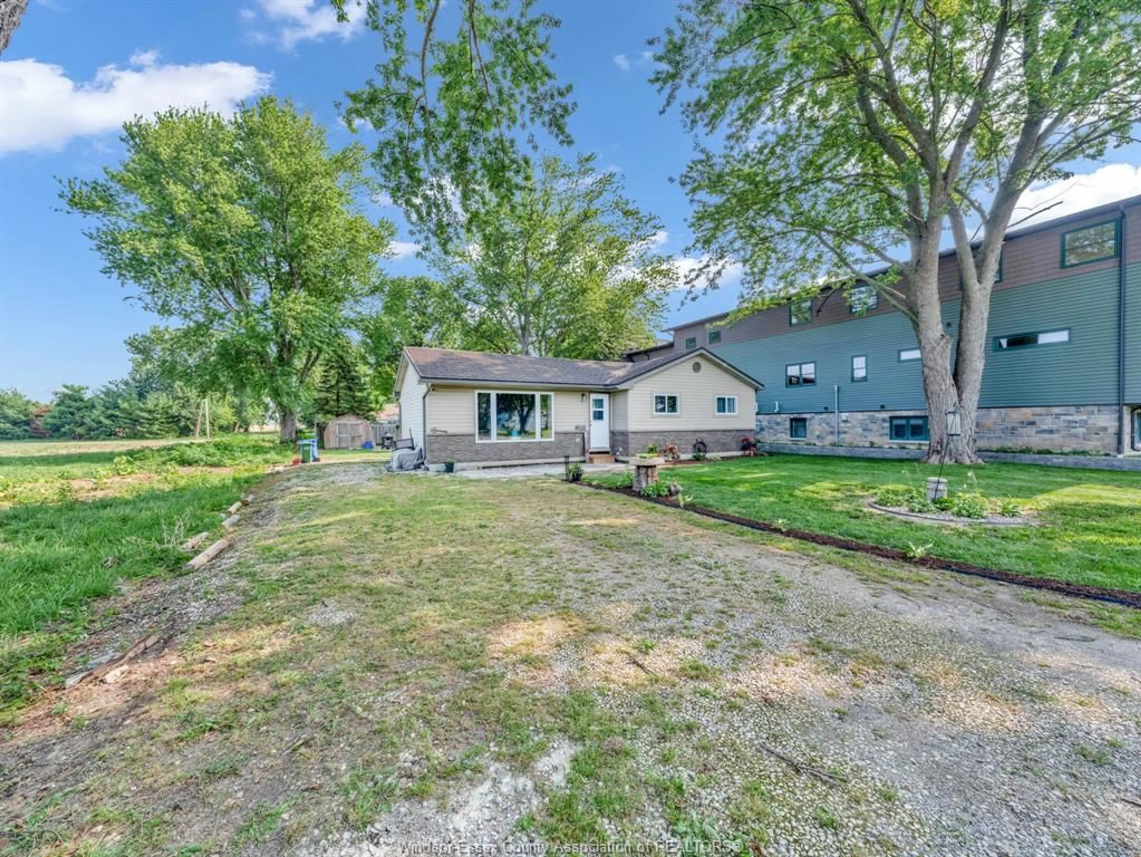 A pic from outside/outdoor area/front of a property/back of a property/a pic from drone, water/lake/river/ocean view for 290 LAKE St, Essex Ontario N0R 1G0