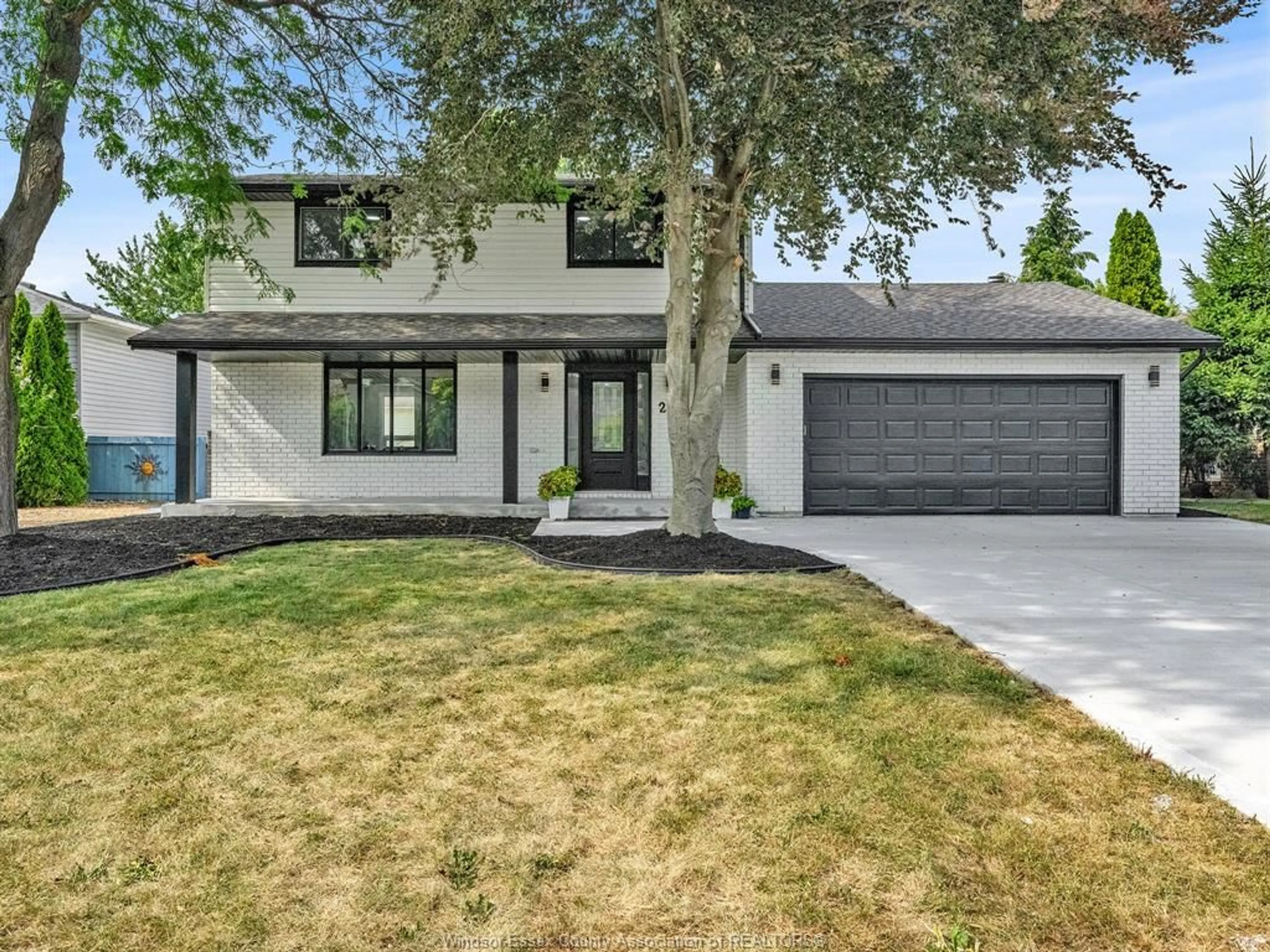 Home with brick exterior material, street for 255 MELANIE Lane, Belle River Ontario N0R 1A0