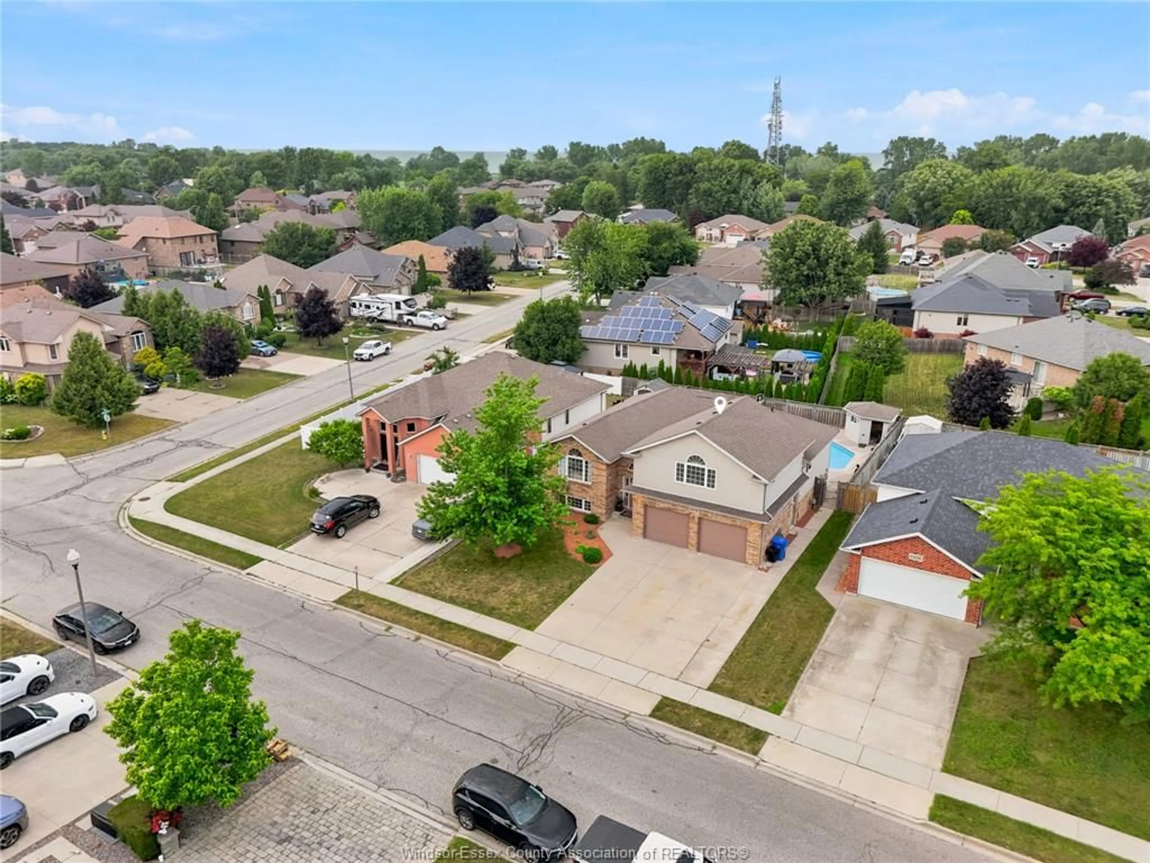 A pic from outside/outdoor area/front of a property/back of a property/a pic from drone, street for 1414 GIRARD Dr, Lakeshore Ontario N0R 1A0