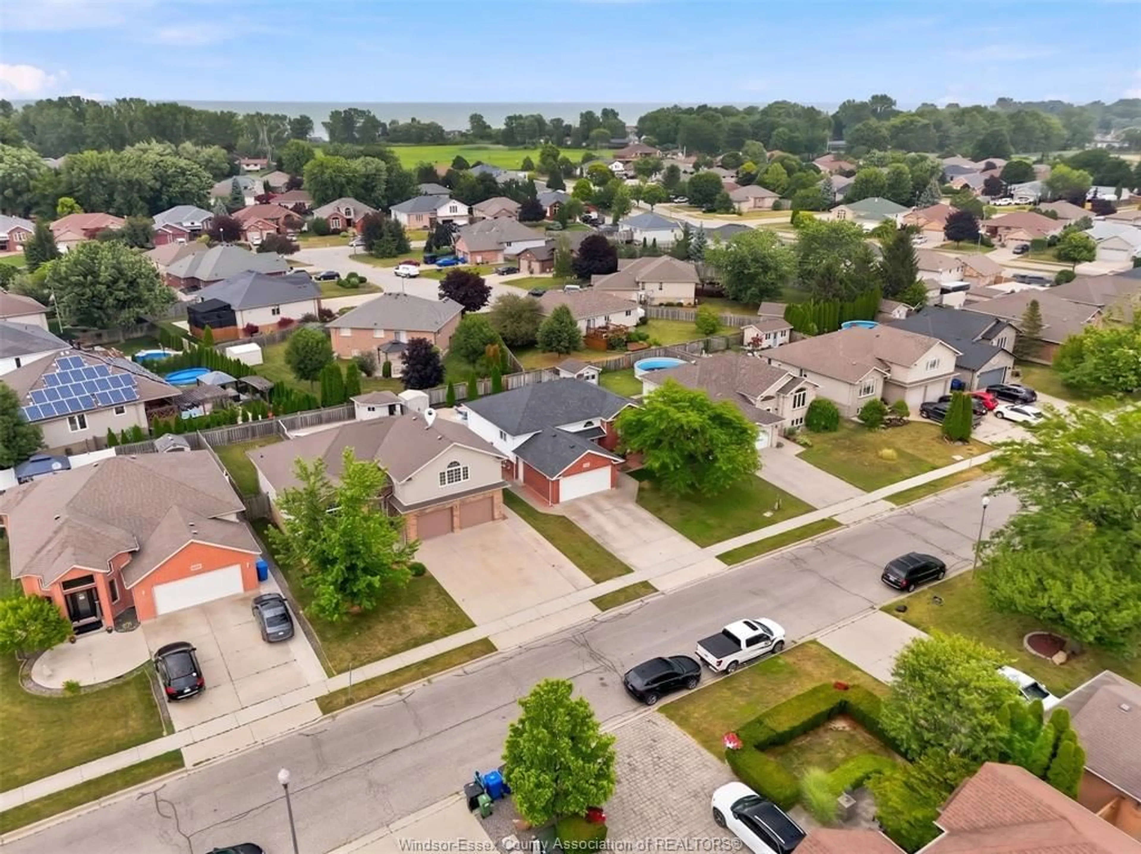 A pic from outside/outdoor area/front of a property/back of a property/a pic from drone, street for 1414 GIRARD Dr, Lakeshore Ontario N0R 1A0