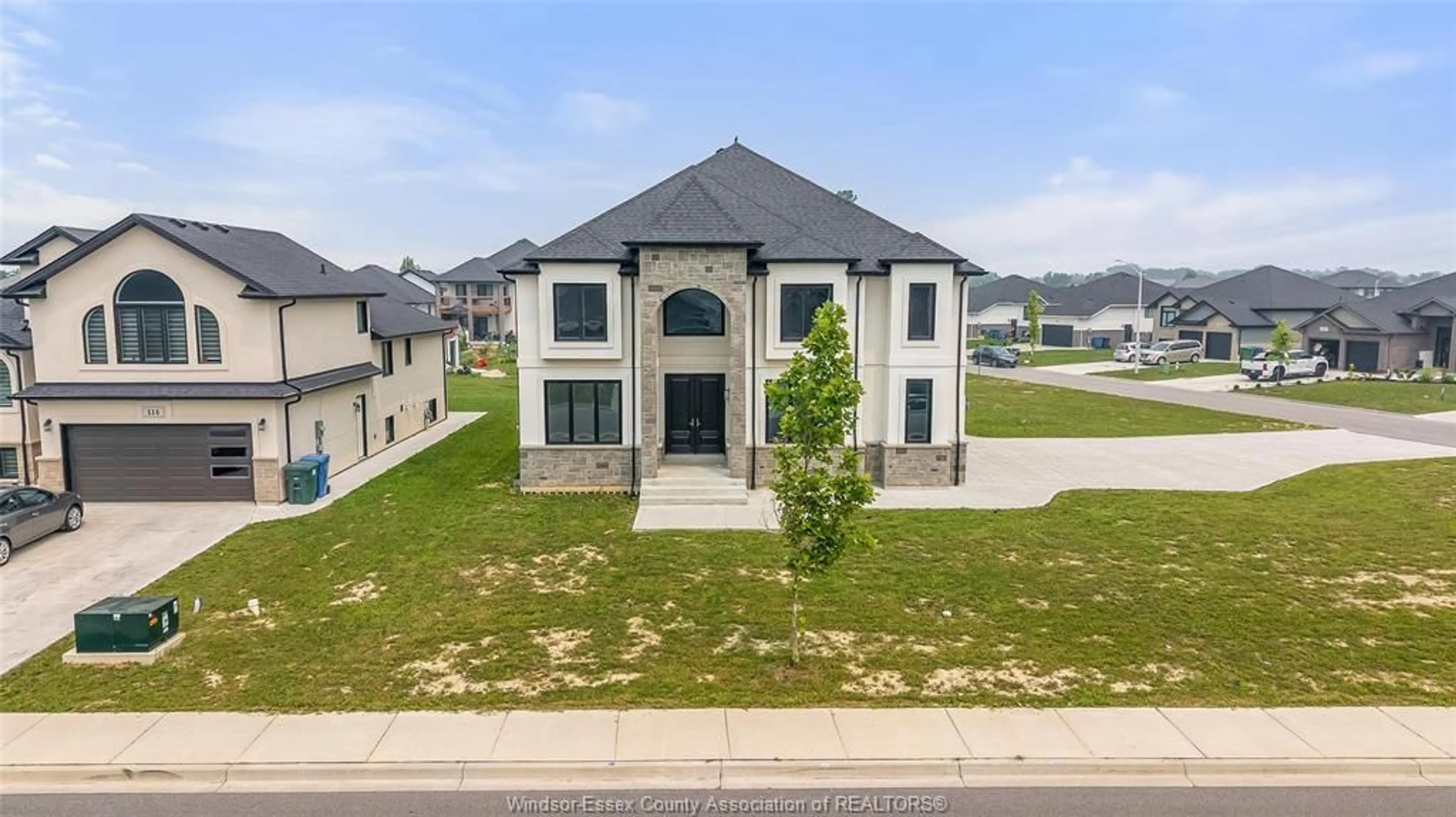 A pic from outside/outdoor area/front of a property/back of a property/a pic from drone, street for 116 KINGSBRIDGE Dr, Amherstburg Ontario N9V 0G8