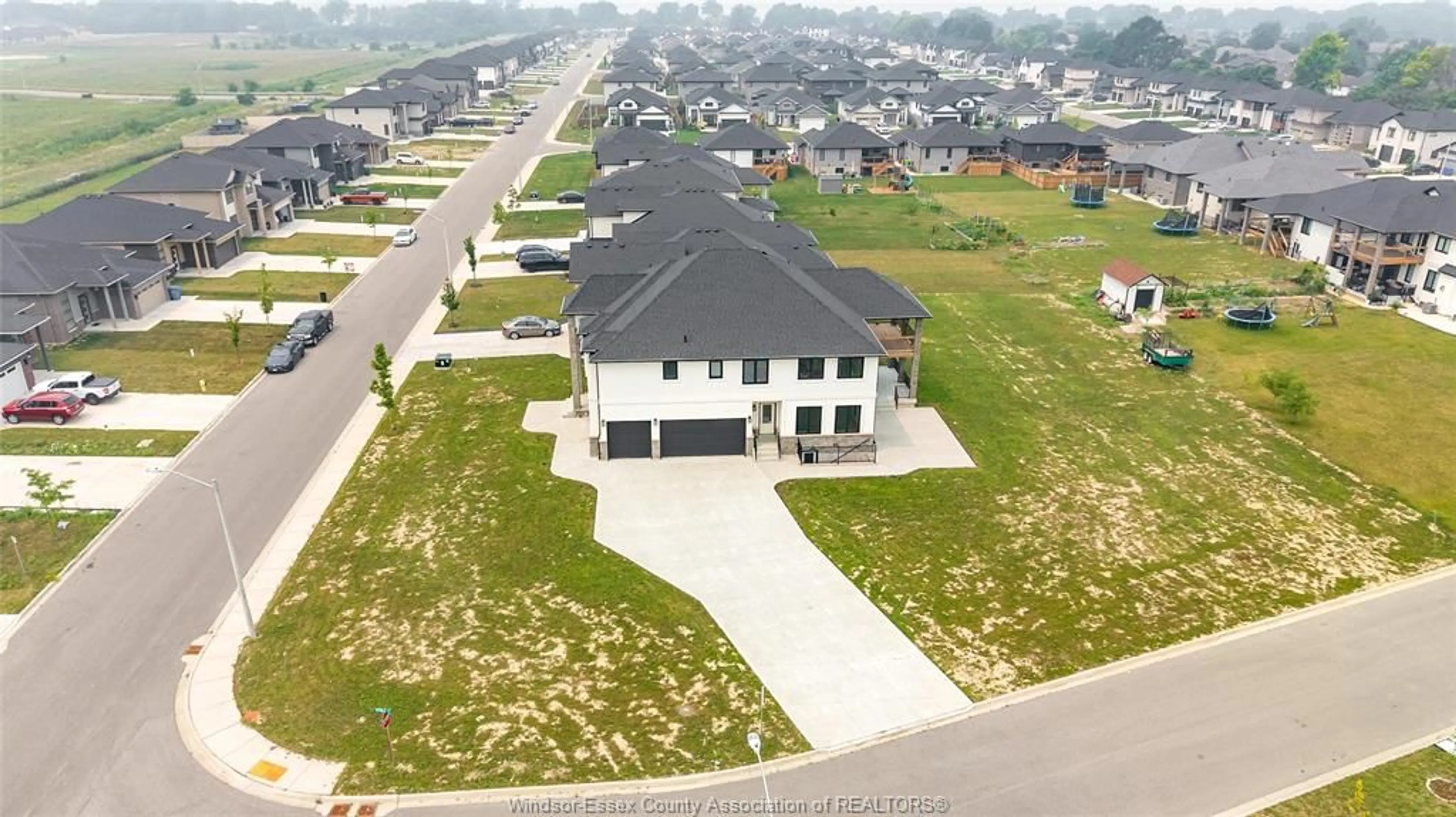 A pic from outside/outdoor area/front of a property/back of a property/a pic from drone, street for 116 KINGSBRIDGE Dr, Amherstburg Ontario N9V 0G8