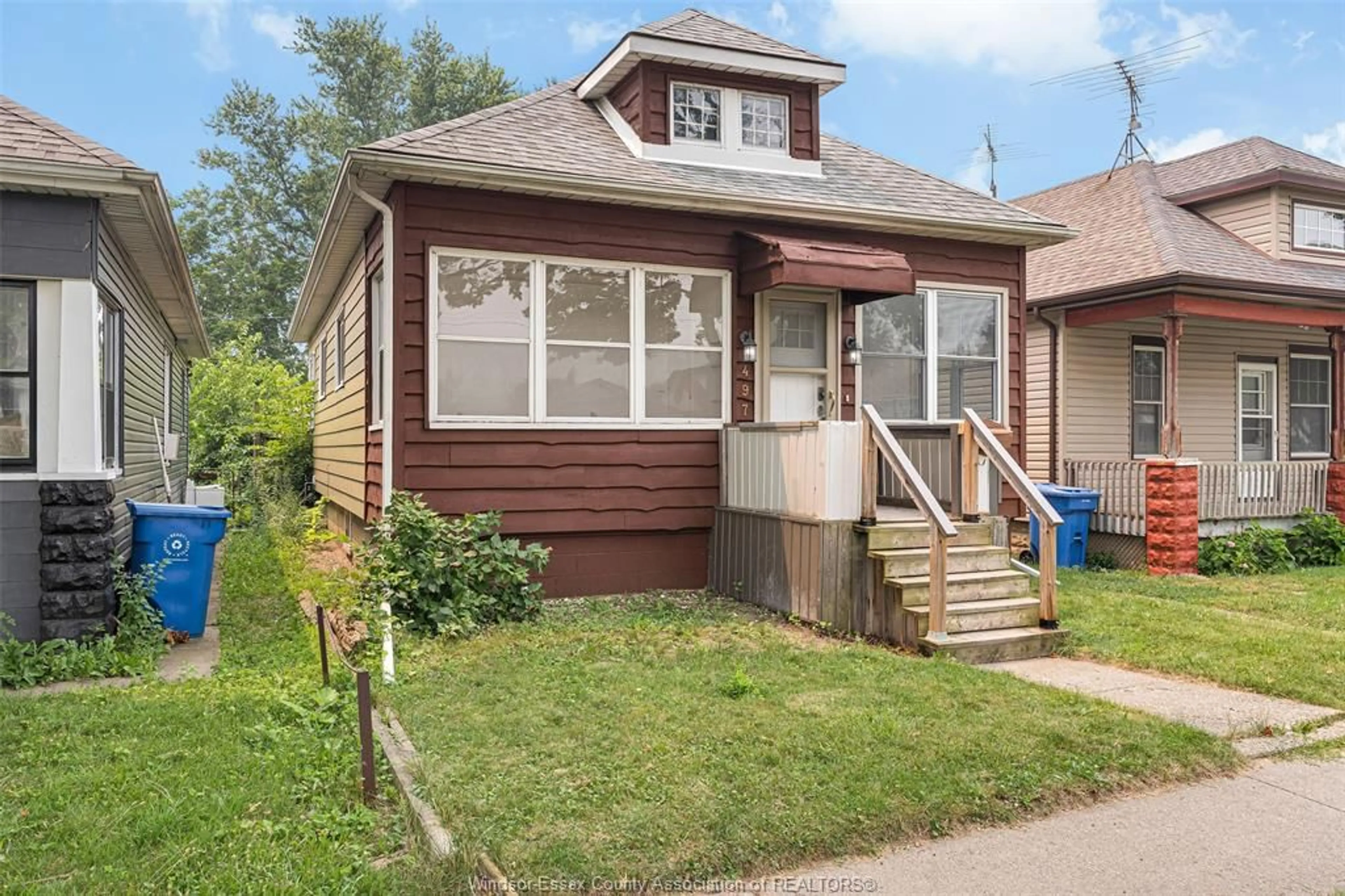 Home with vinyl exterior material, street for 497 MCKAY Ave, Windsor Ontario N9B 1Z7
