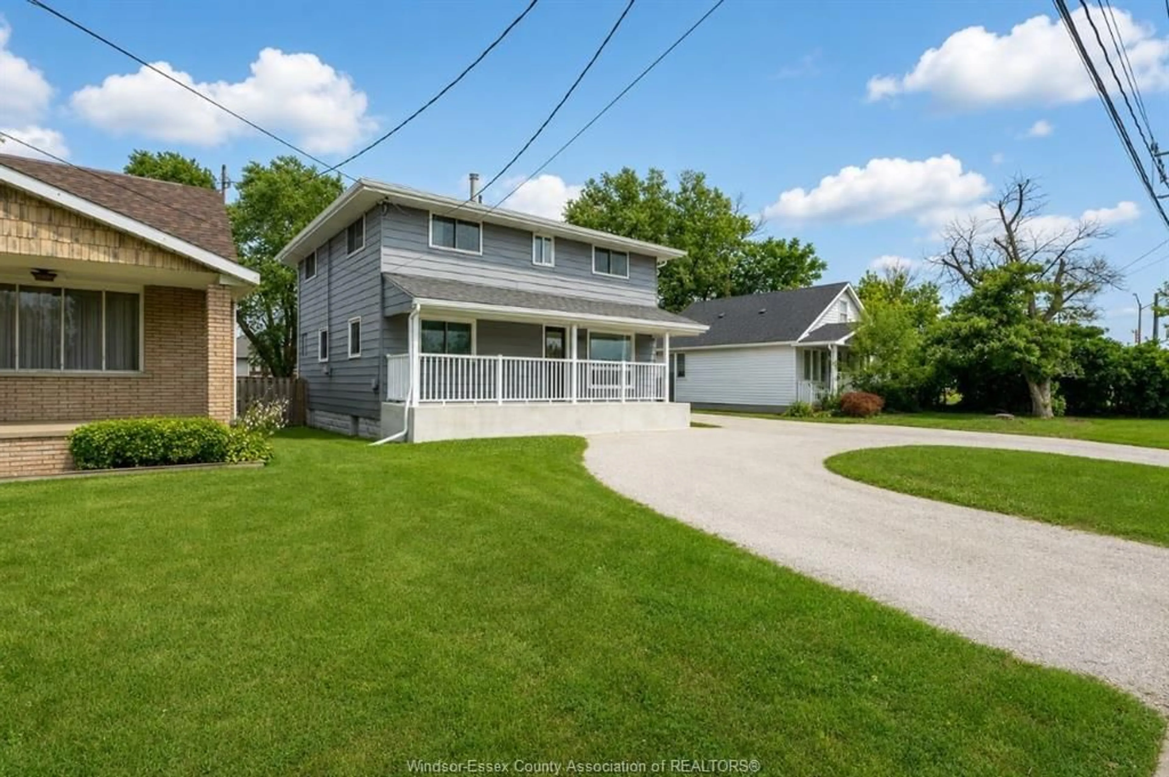 A pic from outside/outdoor area/front of a property/back of a property/a pic from drone, street for 1554 LESPERANCE Rd, Tecumseh Ontario N8N 1Y1