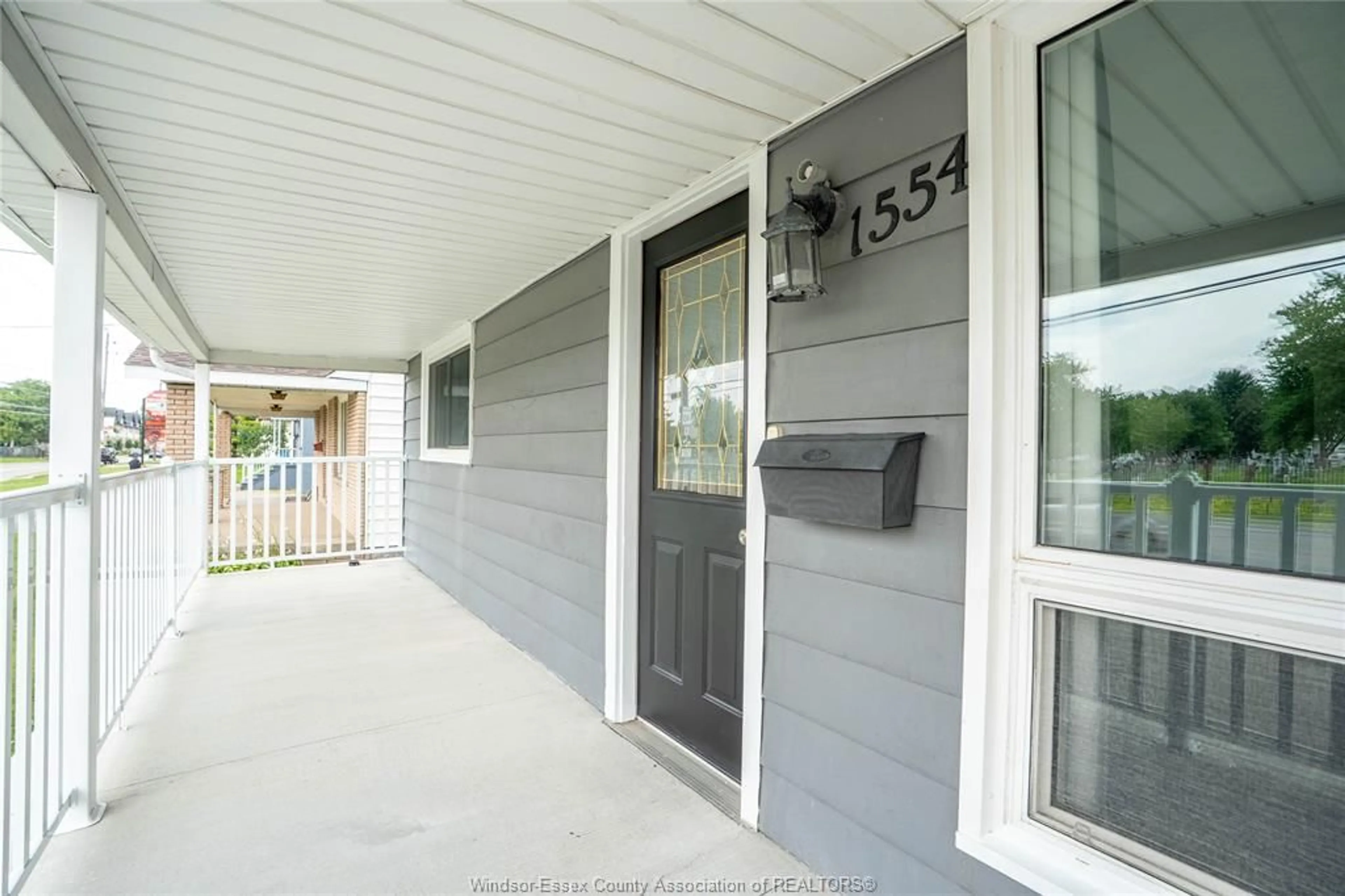 Home with vinyl exterior material, street for 1554 LESPERANCE Rd, Tecumseh Ontario N8N 1Y1