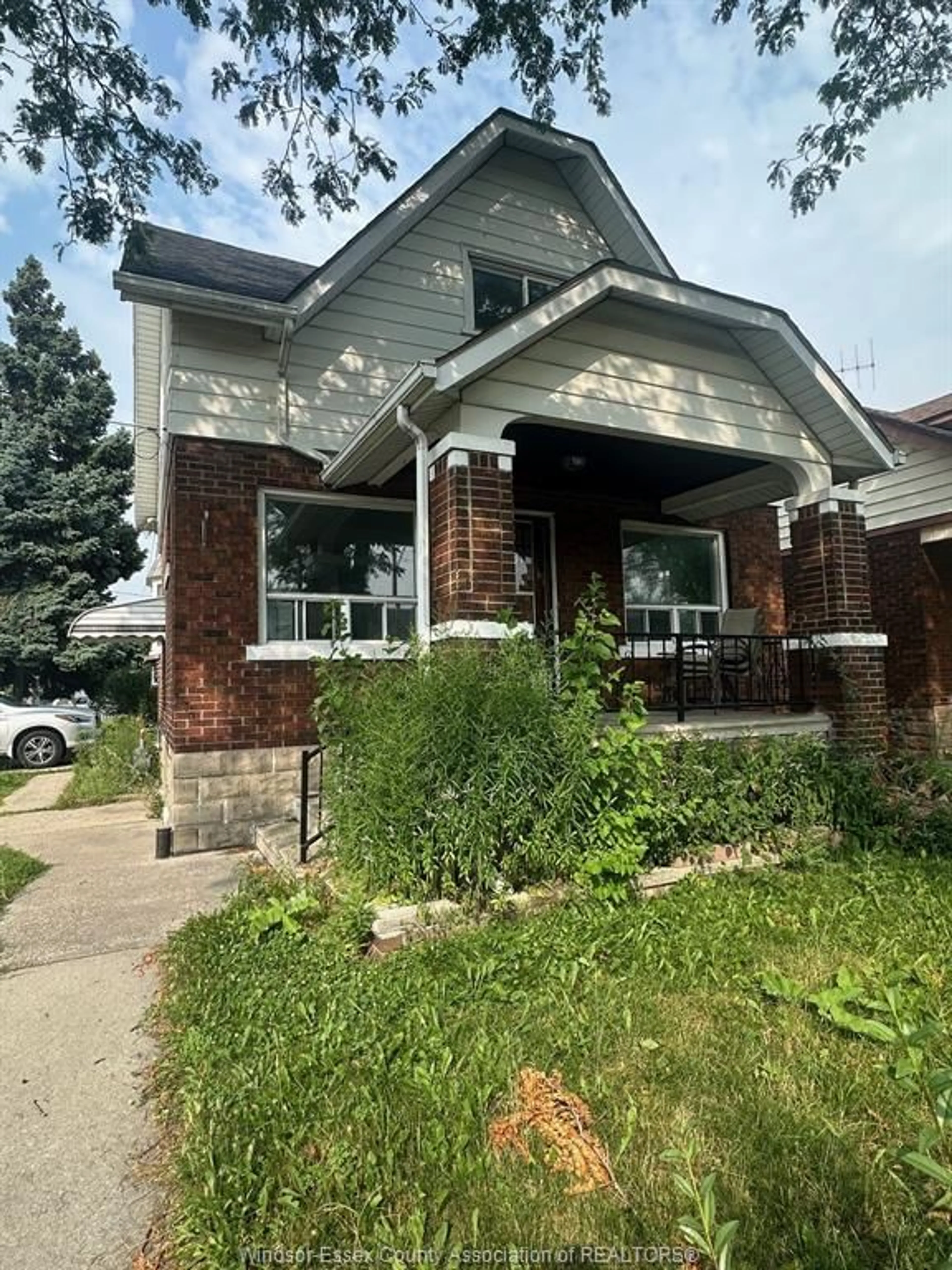 Home with brick exterior material, street for 1495 BENJAMIN, Windsor Ontario N8X 4N2