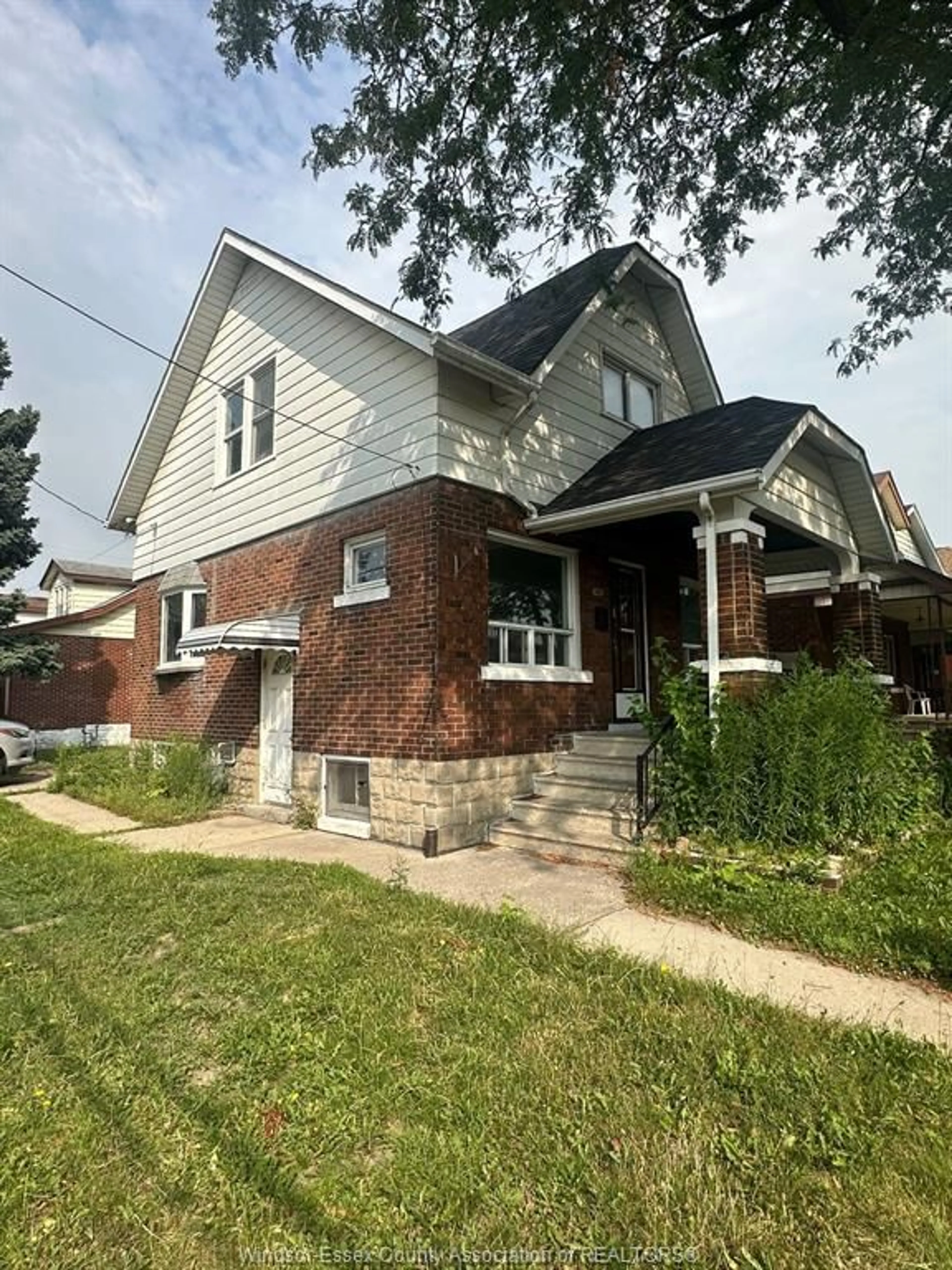 Home with brick exterior material, street for 1495 BENJAMIN, Windsor Ontario N8X 4N2