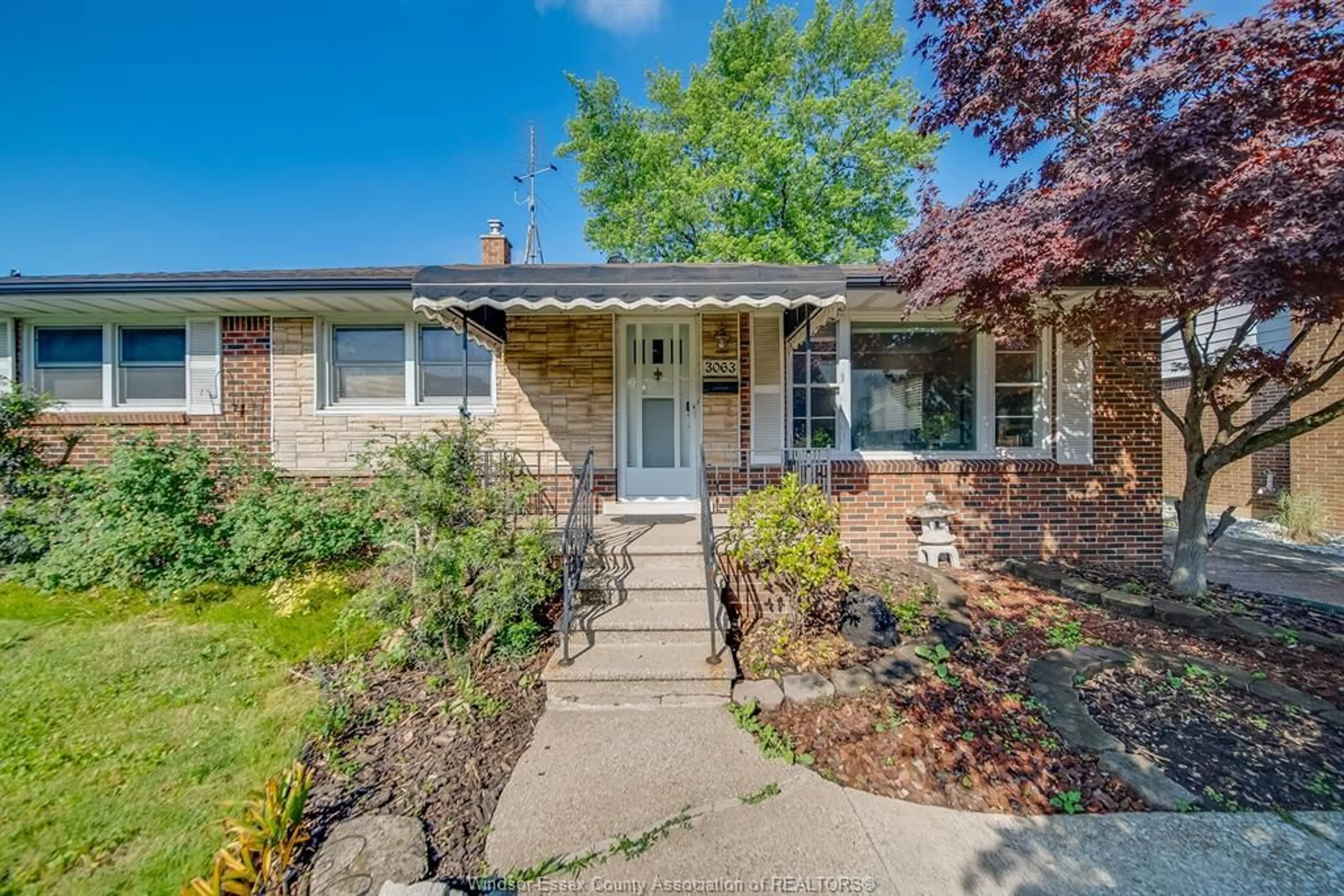 Home with brick exterior material, street for 3063 BRUCE Ave, Windsor Ontario N9E 1W3