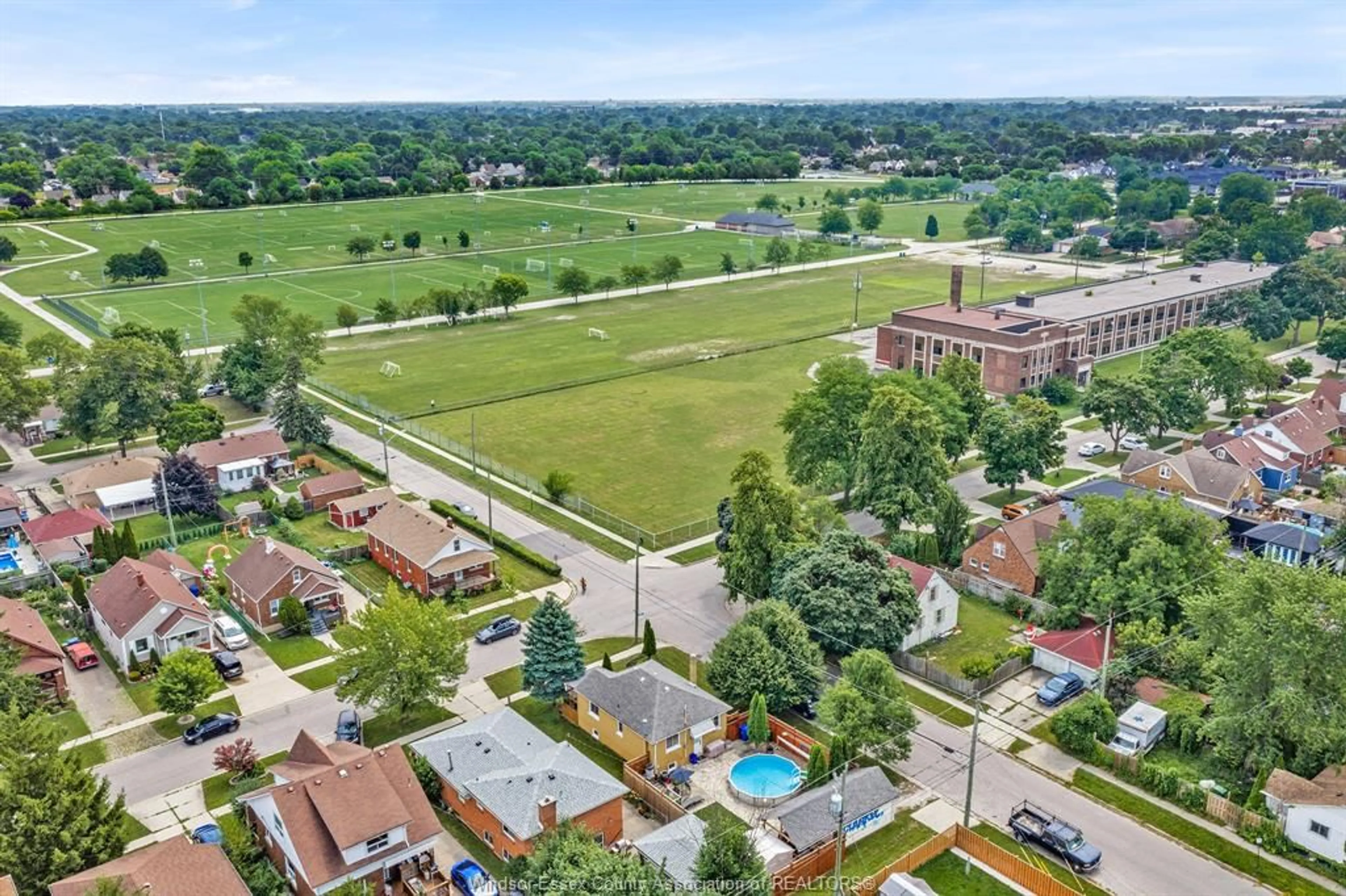 A pic from outside/outdoor area/front of a property/back of a property/a pic from drone, street for 1595 Alexis, Windsor Ontario N8Y 4P1