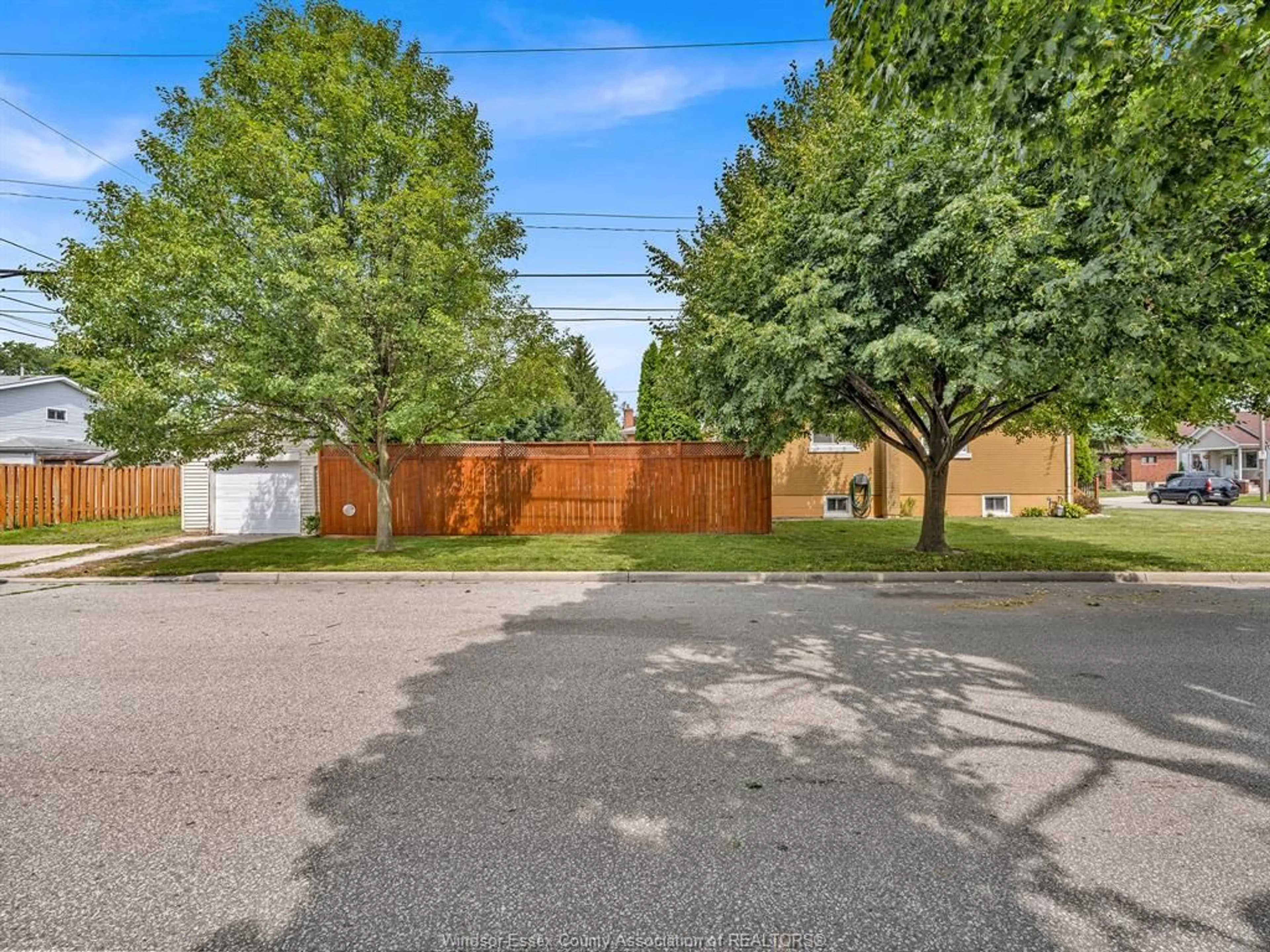 A pic from outside/outdoor area/front of a property/back of a property/a pic from drone, street for 1595 Alexis, Windsor Ontario N8Y 4P1