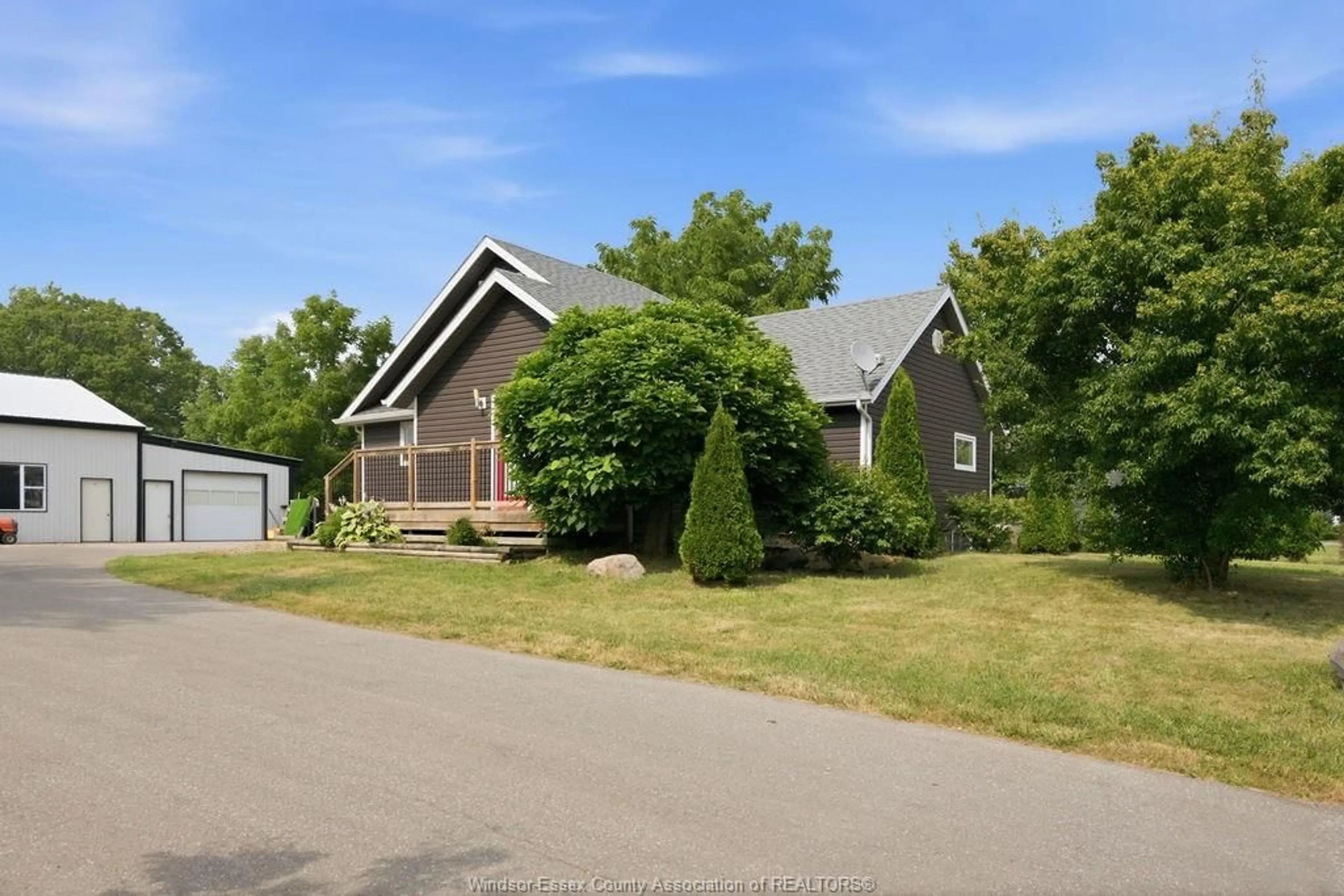 A pic from outside/outdoor area/front of a property/back of a property/a pic from drone, street for 617 TALBOT TRAIL, Wheatley Ontario N0P 2P0