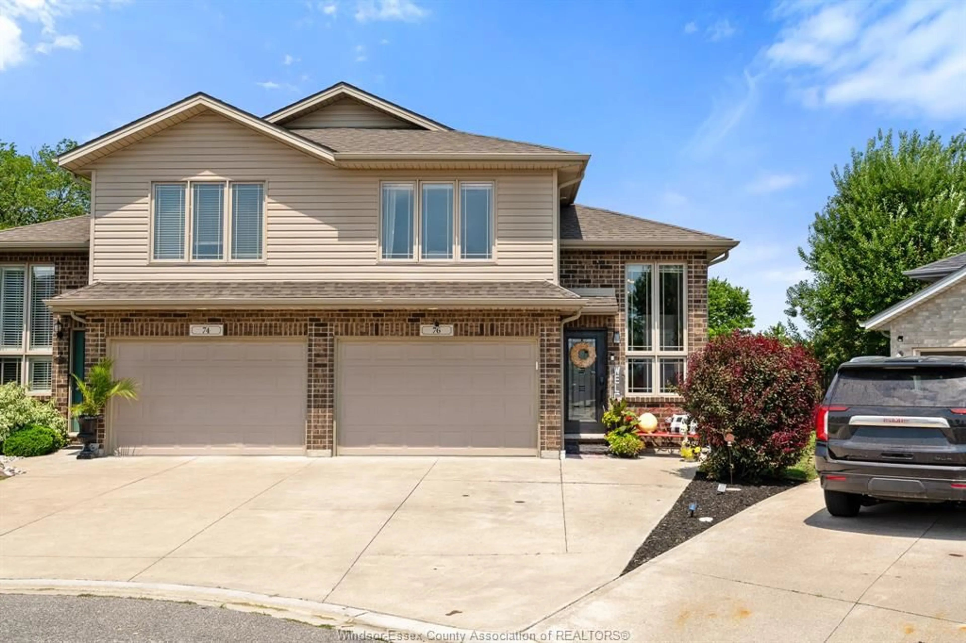 Home with brick exterior material, street for 76 Shaw Drive, Amherstburg Ontario N9V 0B3