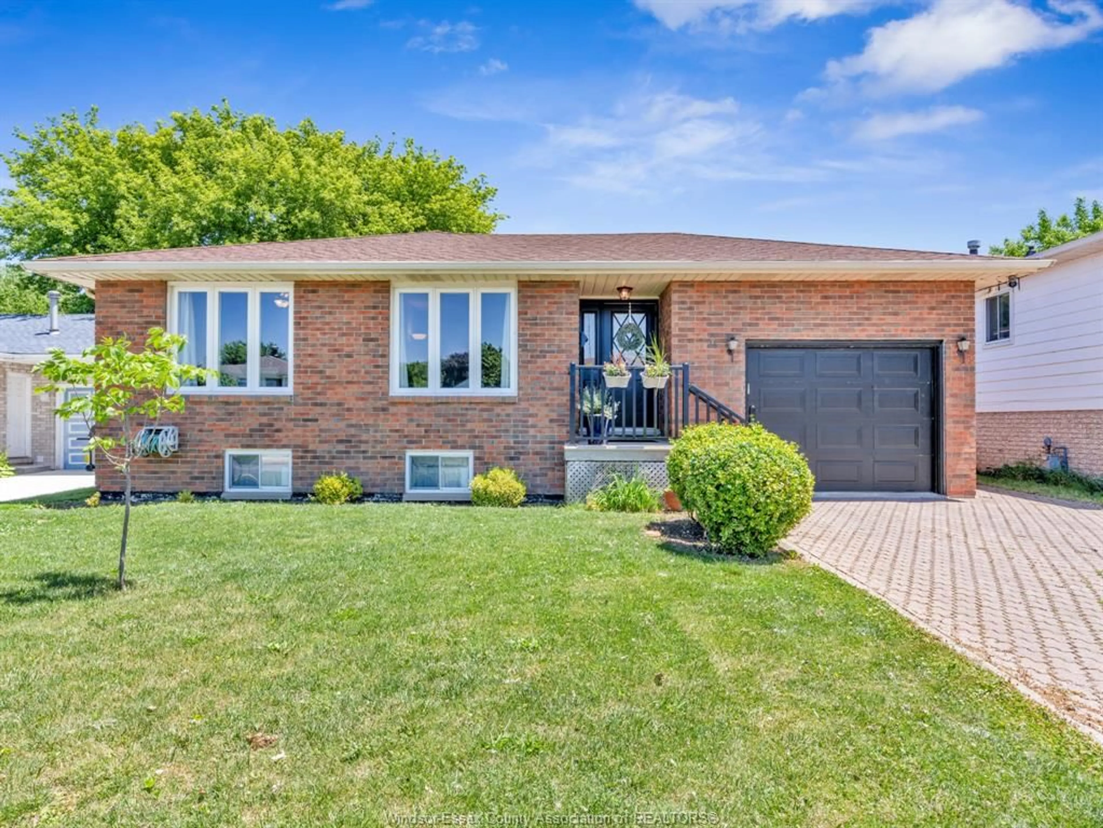 Home with brick exterior material, street for 24 CAMELOT Ave, Leamington Ontario N8H 4V6
