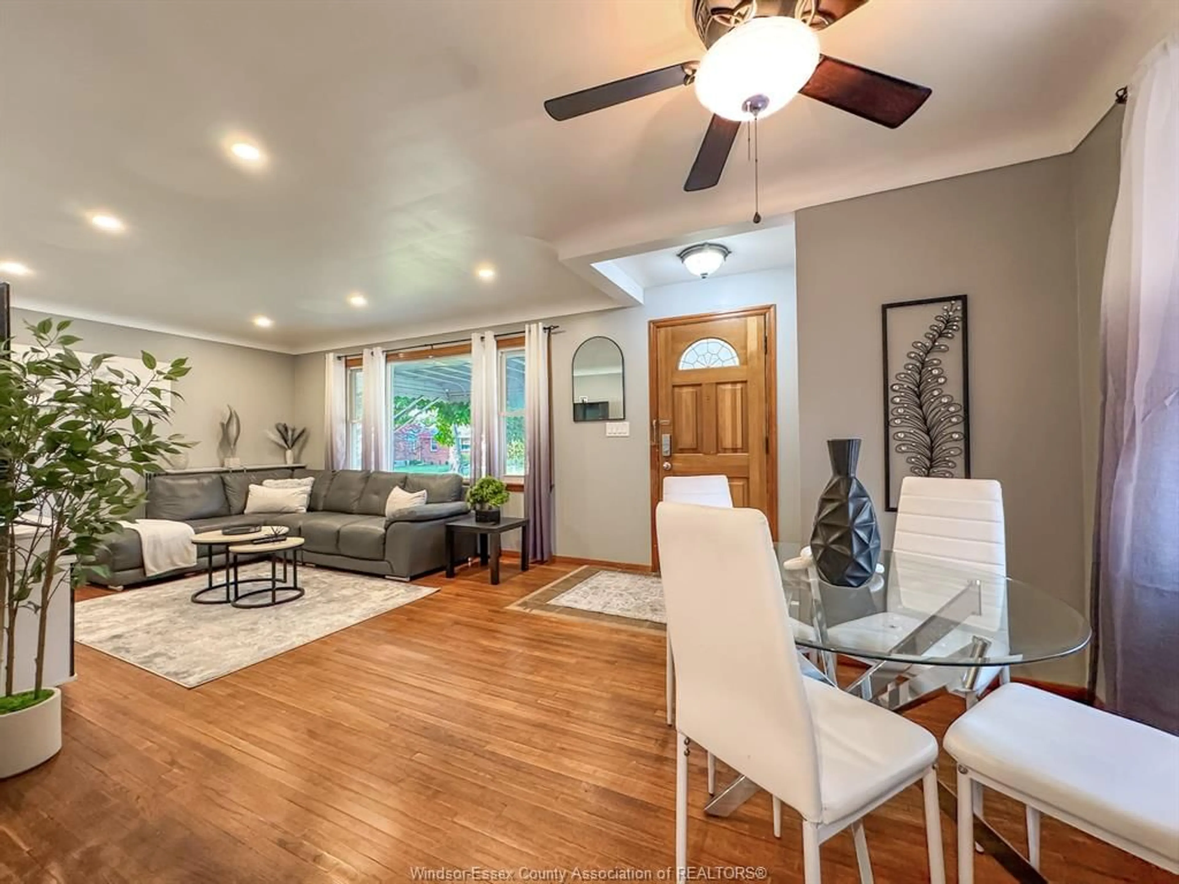 Living room with furniture, wood/laminate floor for 979 BELLEPERCHE PLACE, Windsor Ontario N8S 3C2