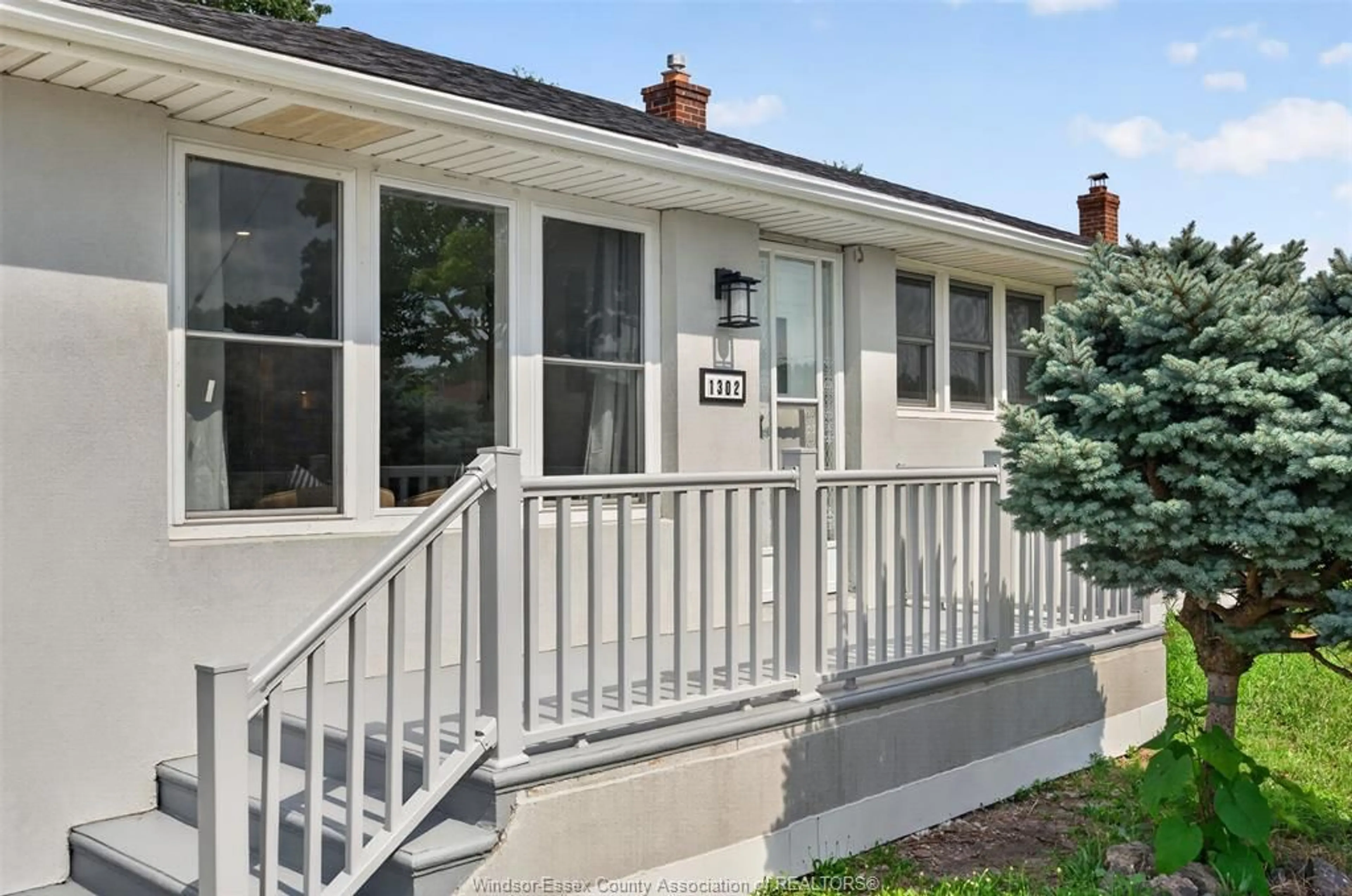 Home with vinyl exterior material, street for 1302 Josephine, Windsor Ontario N9B 2L9