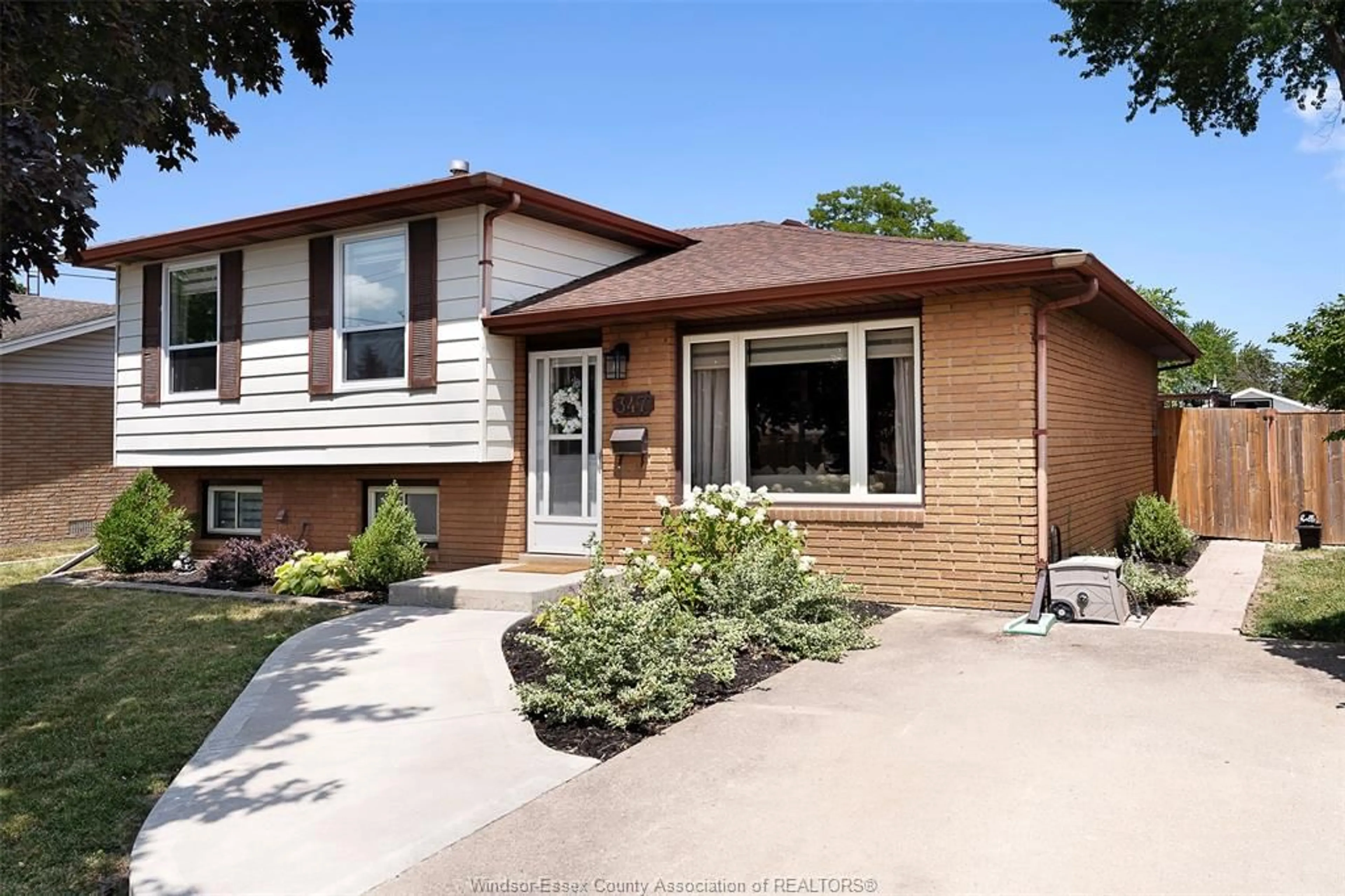 Home with brick exterior material, street for 347 St. Peter St, Belle River Ontario N0R 1A0