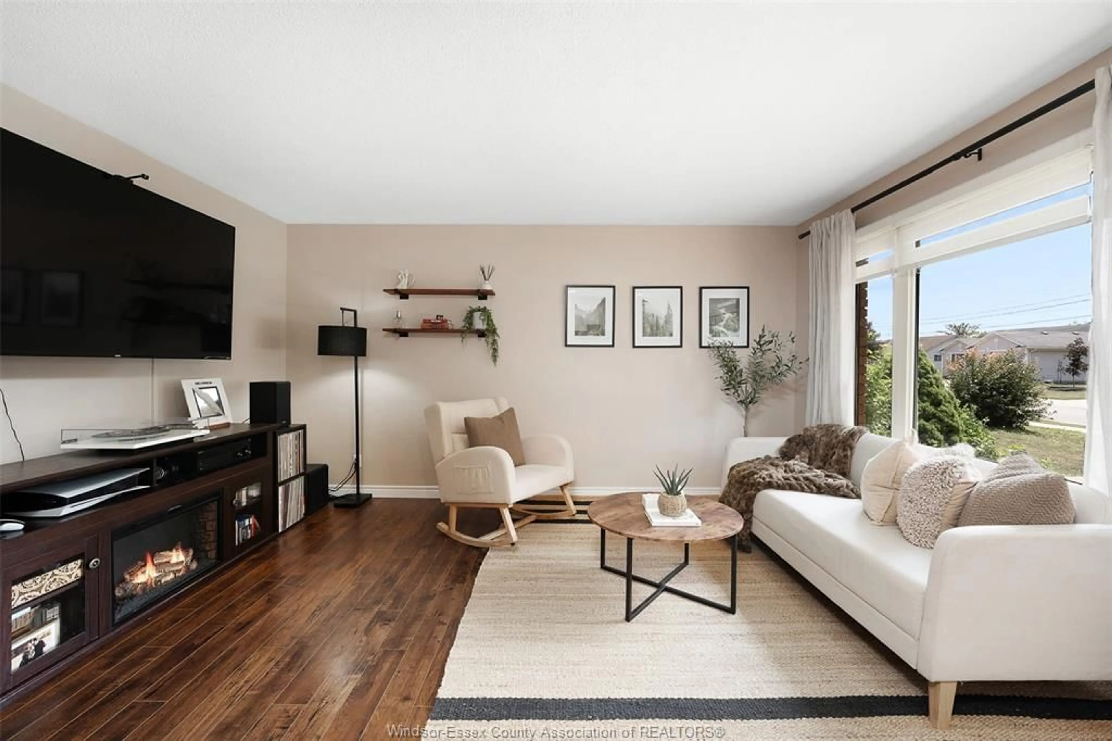 Living room with furniture, wood/laminate floor for 347 St. Peter St, Belle River Ontario N0R 1A0