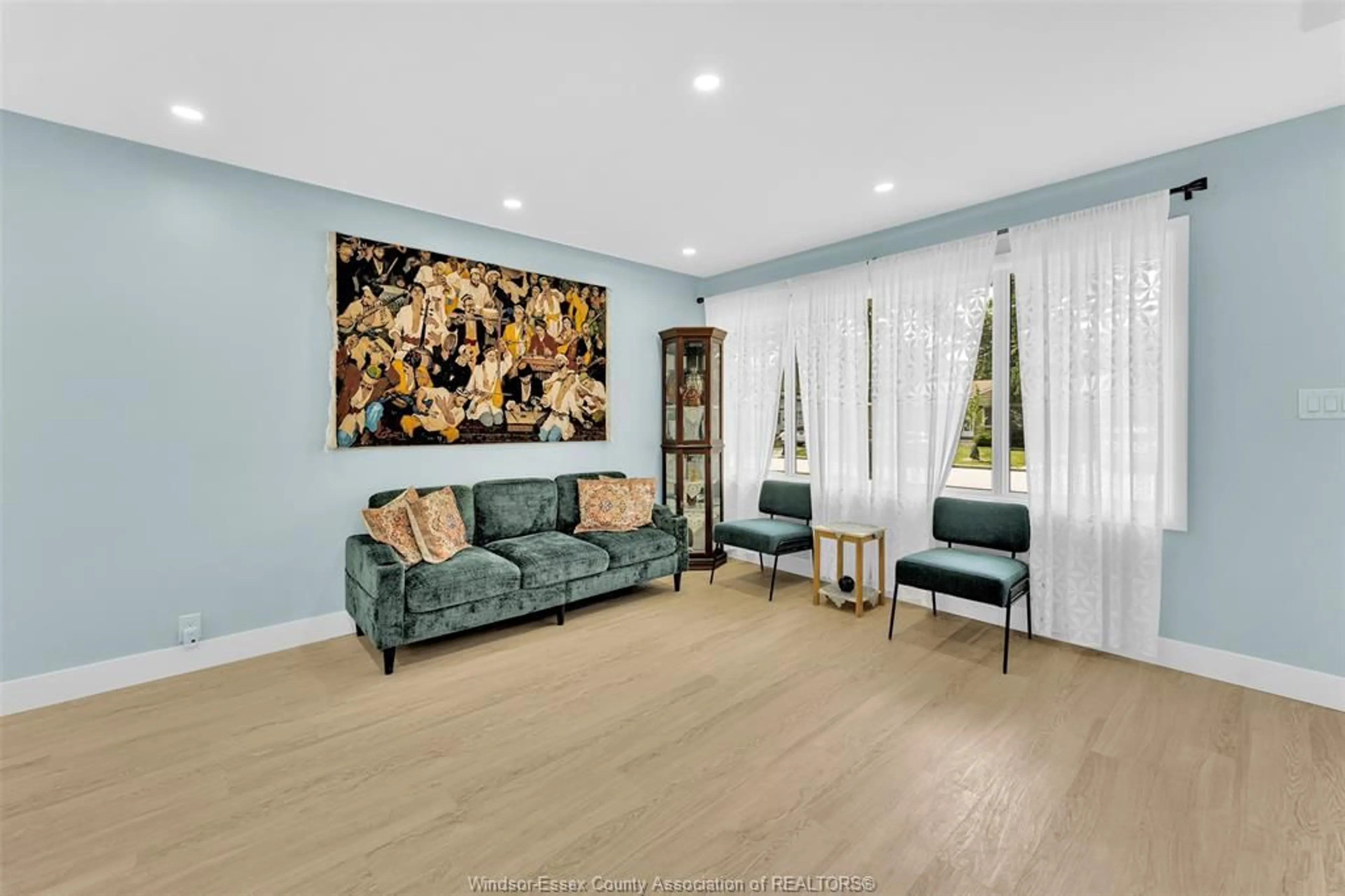 Living room with furniture, wood/laminate floor for 3660 ROXBOROUGH, Windsor Ontario N9E 3A2