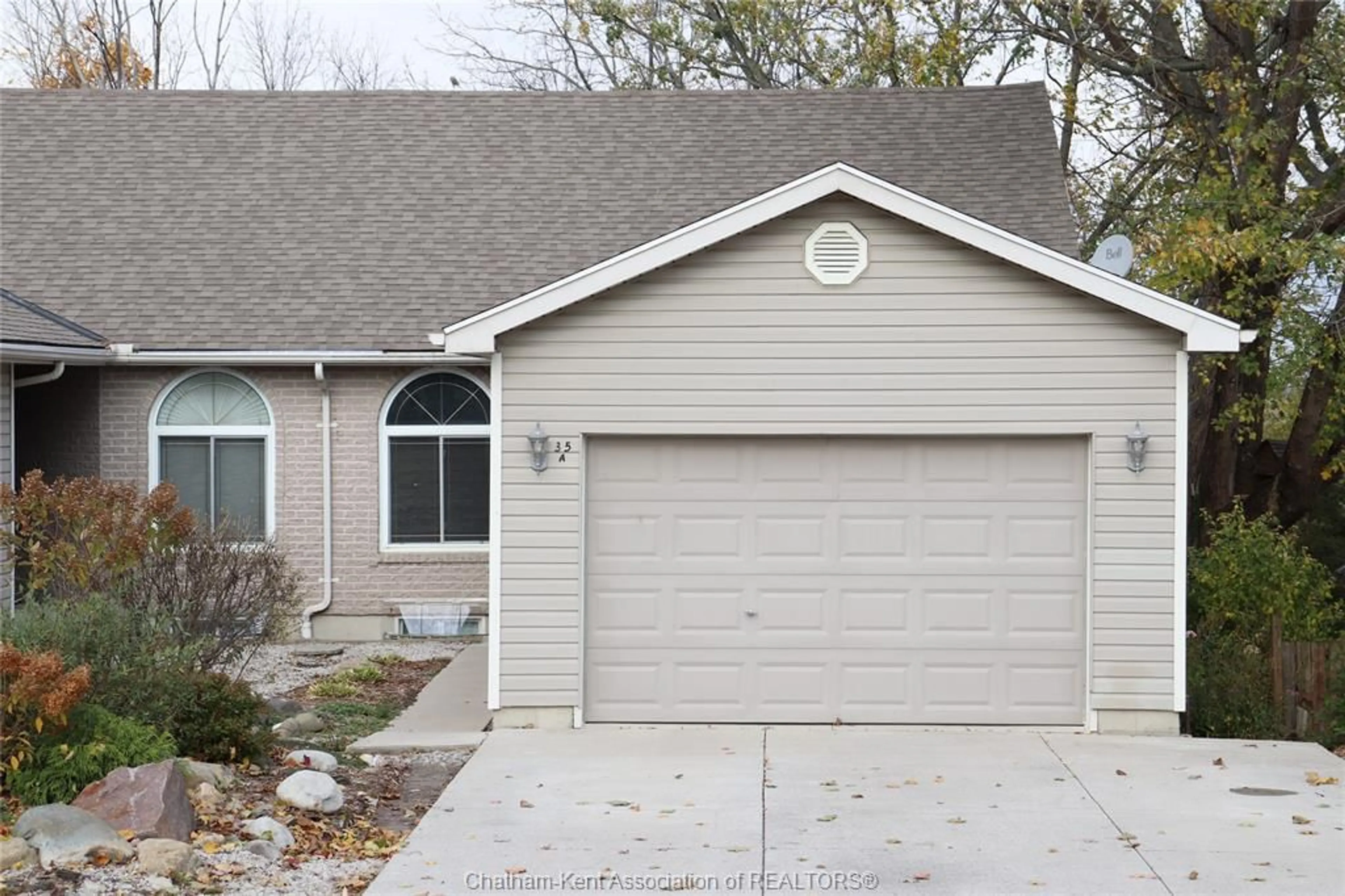 Home with vinyl exterior material, street for 35-A Tiffany St, Ridgetown Ontario N0P 2C0