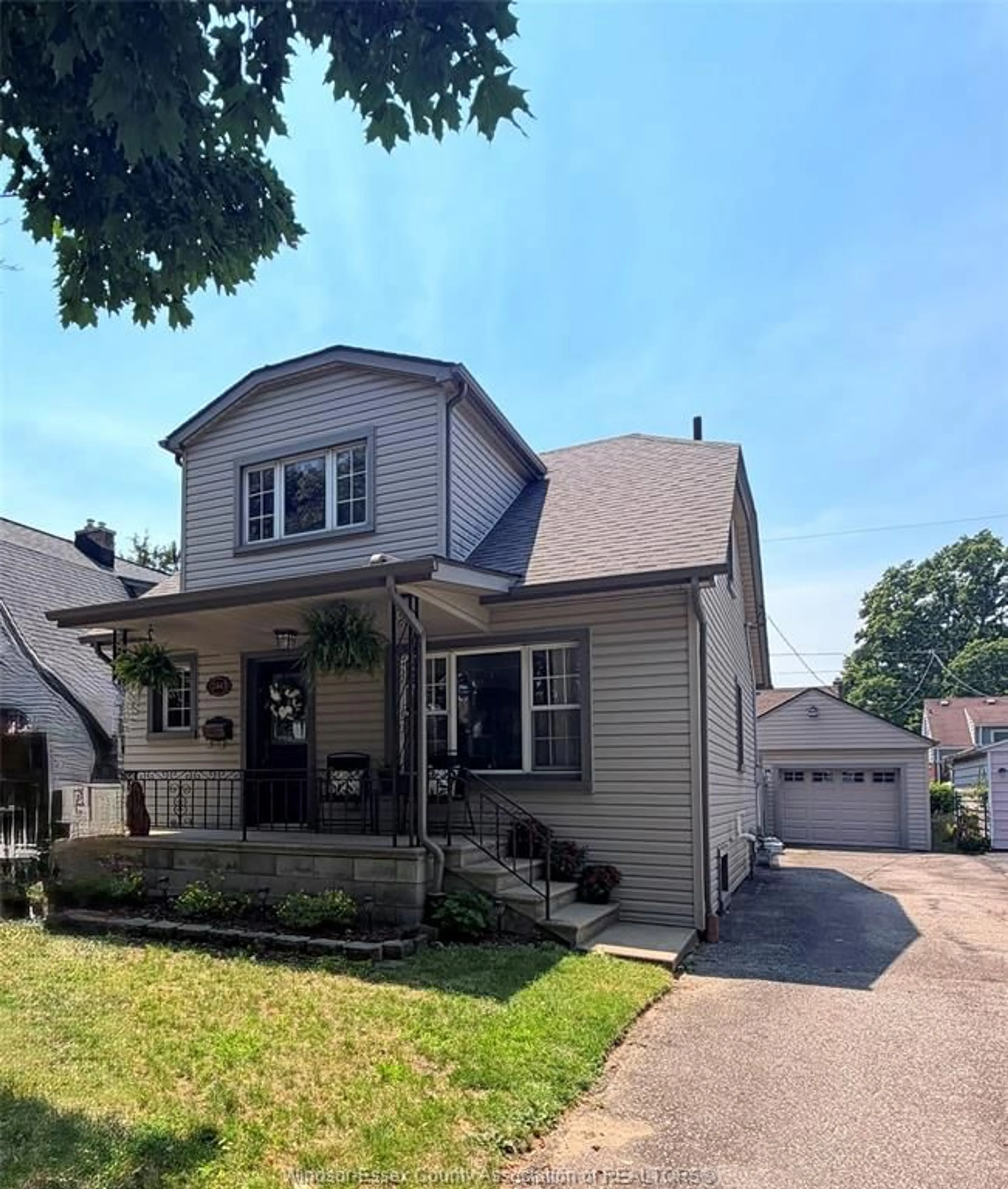Home with vinyl exterior material, street for 2443 TURNER Rd, Windsor Ontario N8W 3K9