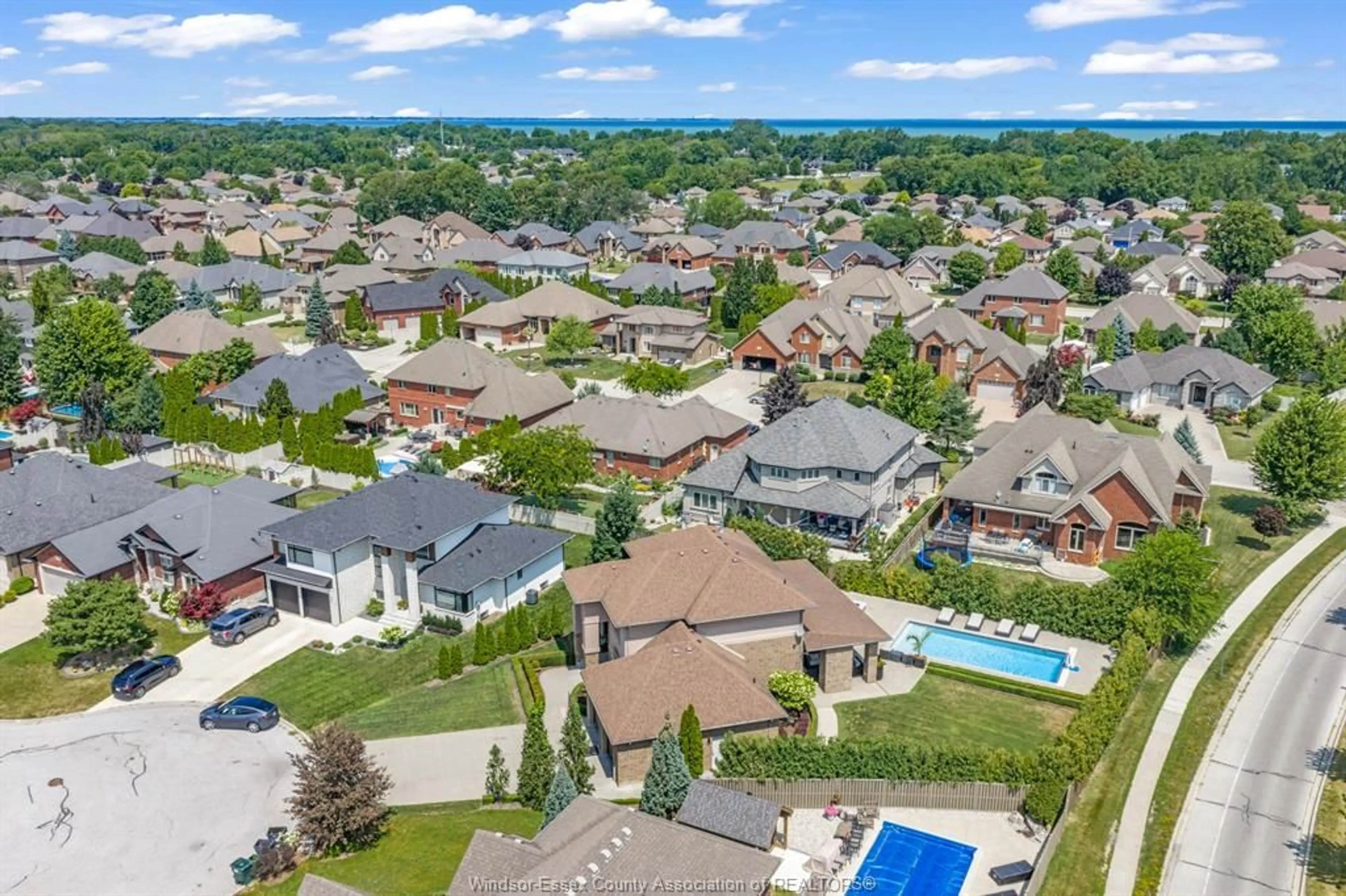 A pic from outside/outdoor area/front of a property/back of a property/a pic from drone, unknown for 1060 WOODLAND Cres, Lakeshore Ontario N0R 1A0