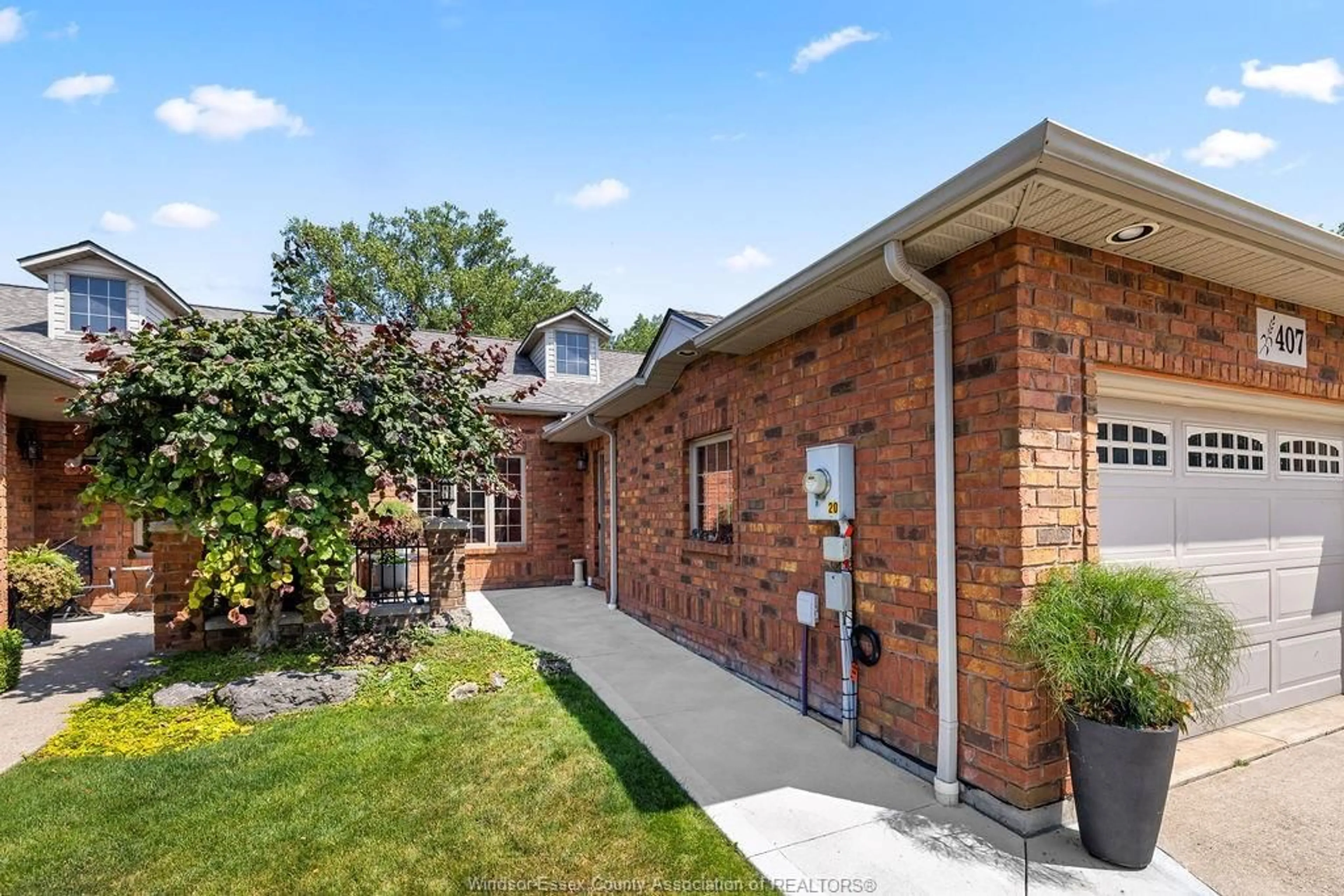 Home with brick exterior material, street for 407 LENORE ST, Belle River Ontario N8L 0P3