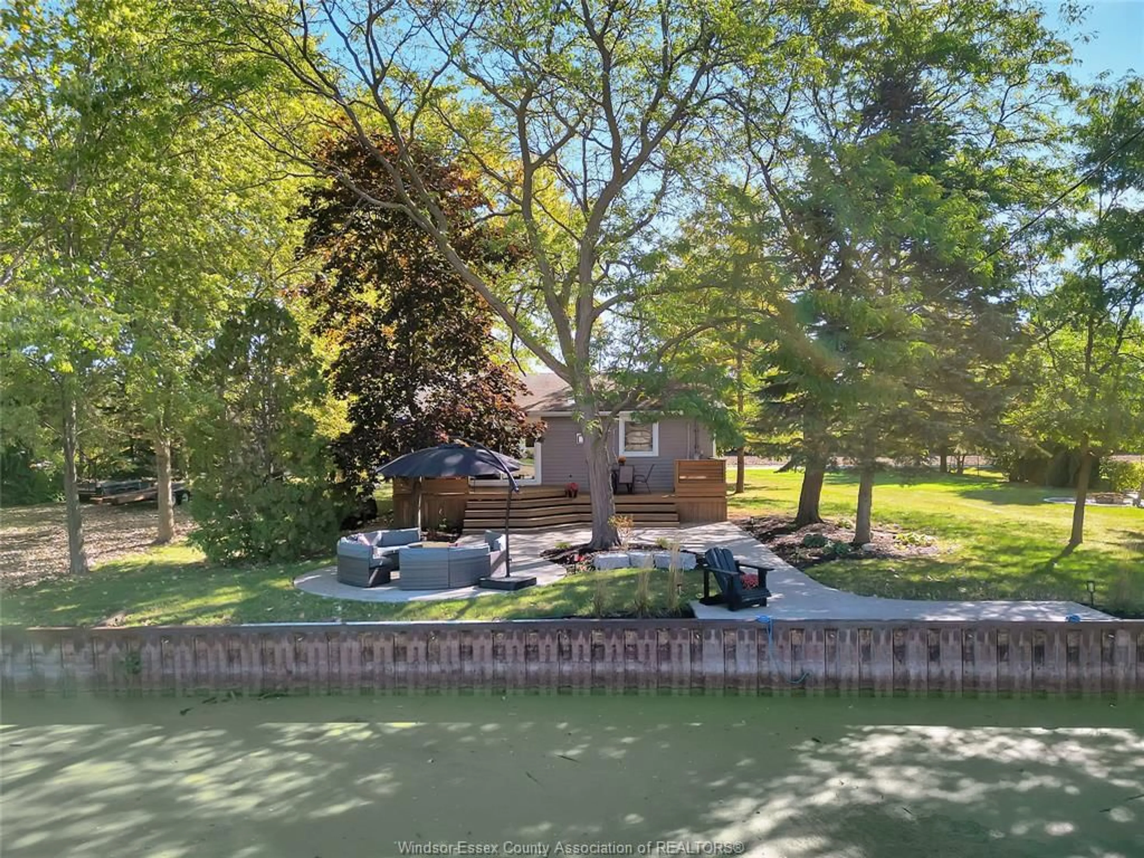 A pic from outside/outdoor area/front of a property/back of a property/a pic from drone, water/lake/river/ocean view for 255 EDWARD Rd, Lakeshore Ontario N0R 1S0