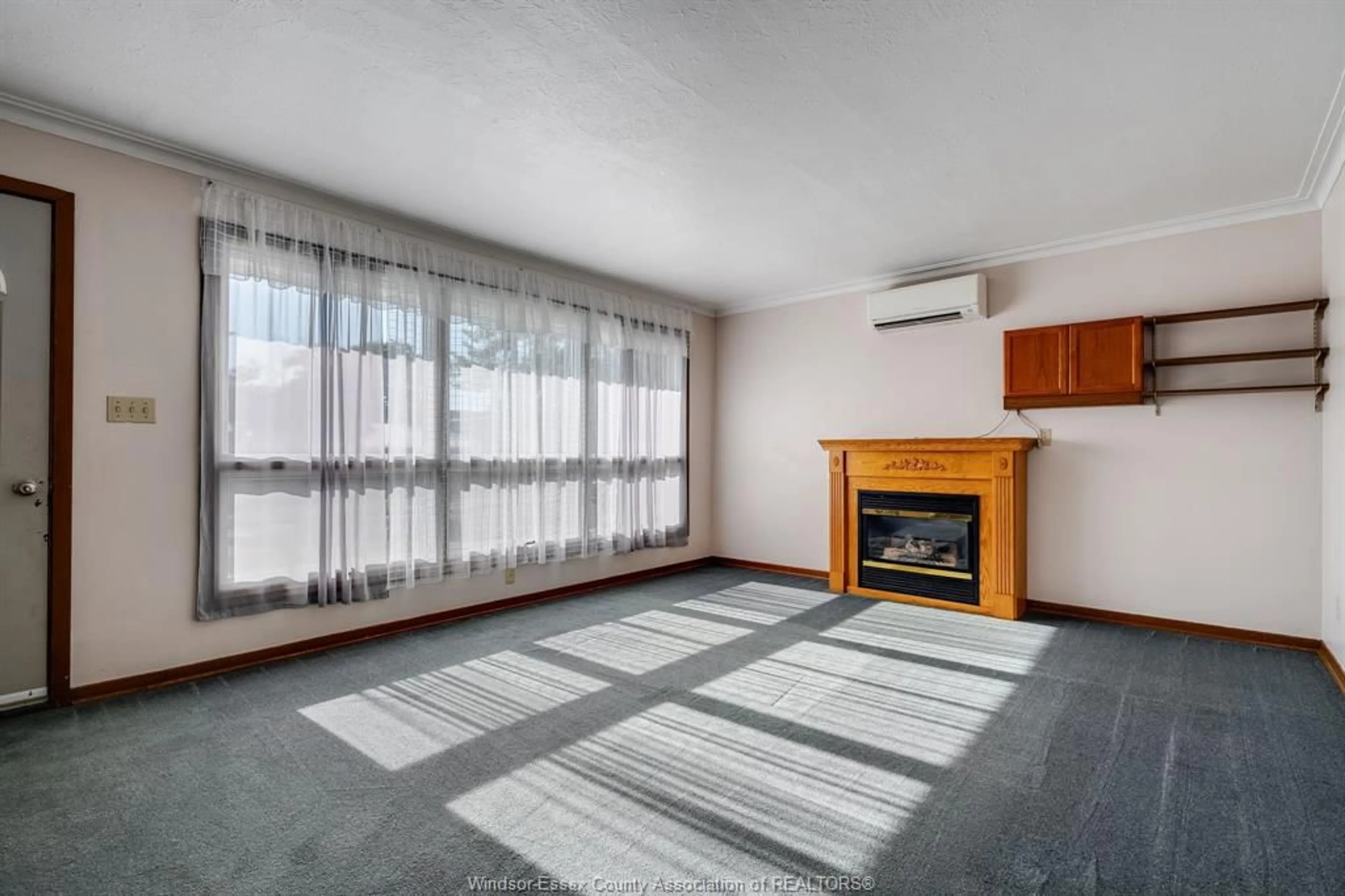 Living room with furniture, unknown for 23 Garrison Ave, Leamington Ontario N8H 2P1