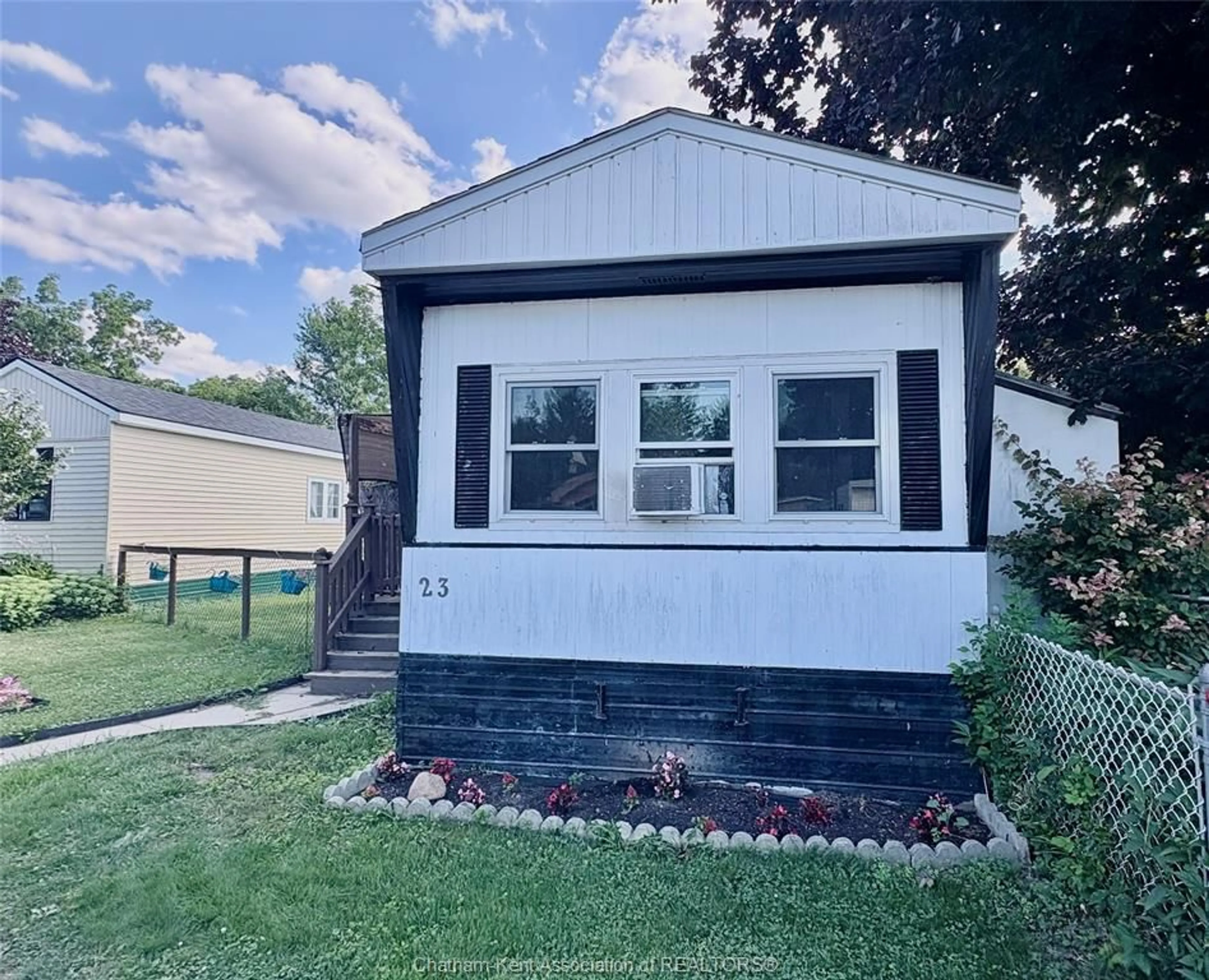 Home with vinyl exterior material, street for 9480 LONGWOODS Rd, Chatham-Kent Ontario N7M 5J7