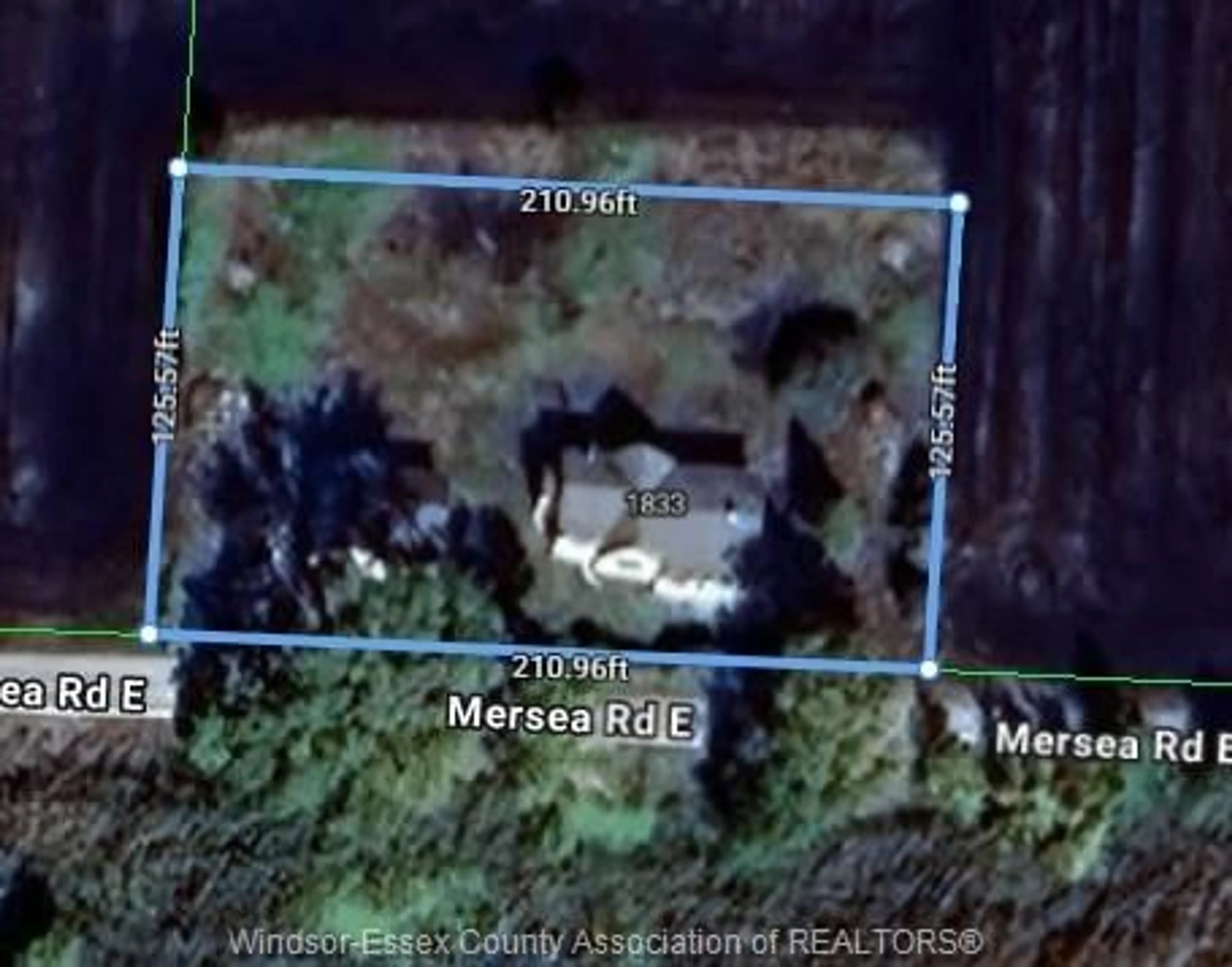 A pic from outside/outdoor area/front of a property/back of a property/a pic from drone, street for 1833 Mersea Rd E, Leamington Ontario N8H 3V4