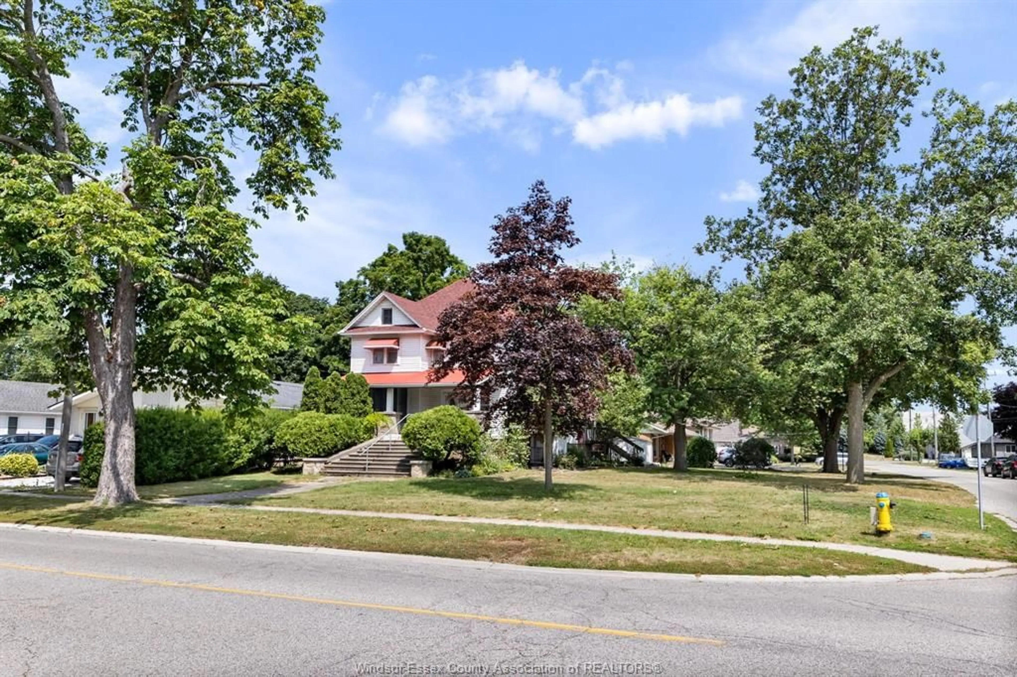 A pic from outside/outdoor area/front of a property/back of a property/a pic from drone, street for 495 Broadway, Belle River Ontario N0R 1A0