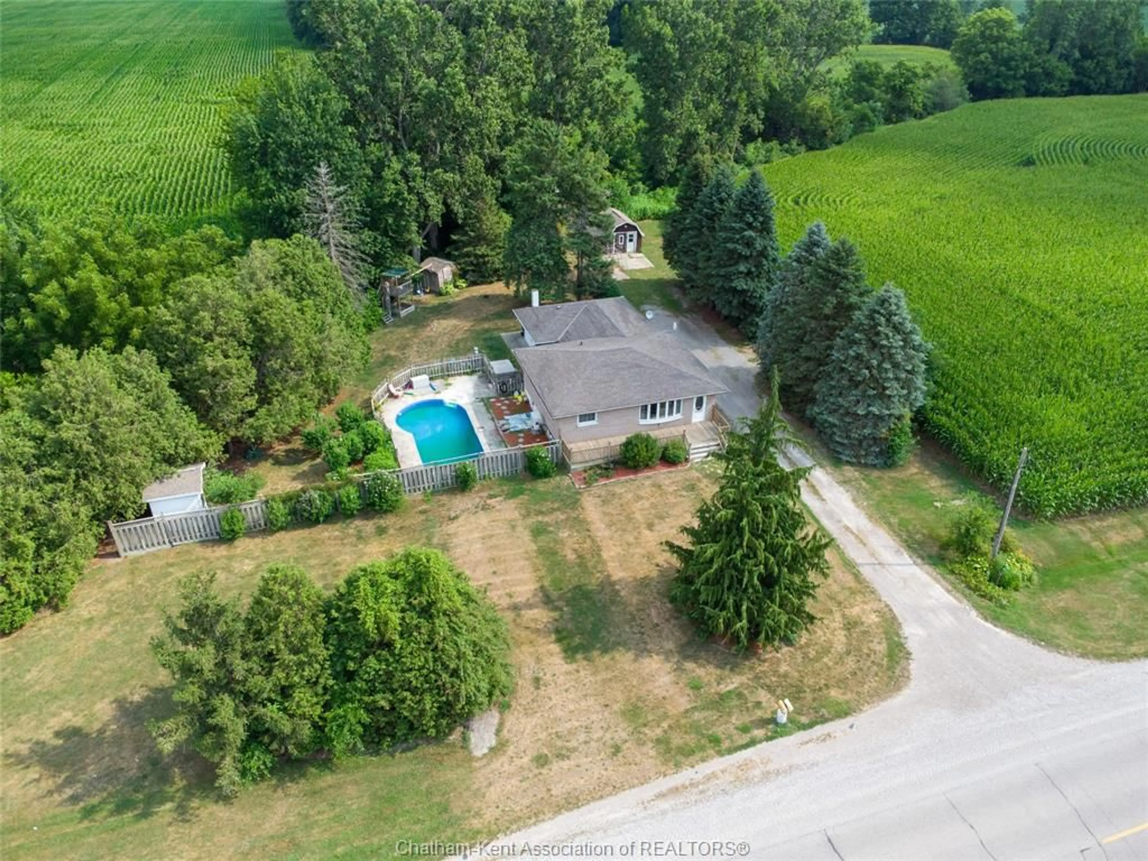 A pic from outside/outdoor area/front of a property/back of a property/a pic from drone, water/lake/river/ocean view for 12129 Baseline Rd, Thamesville Ontario N0P 2K0