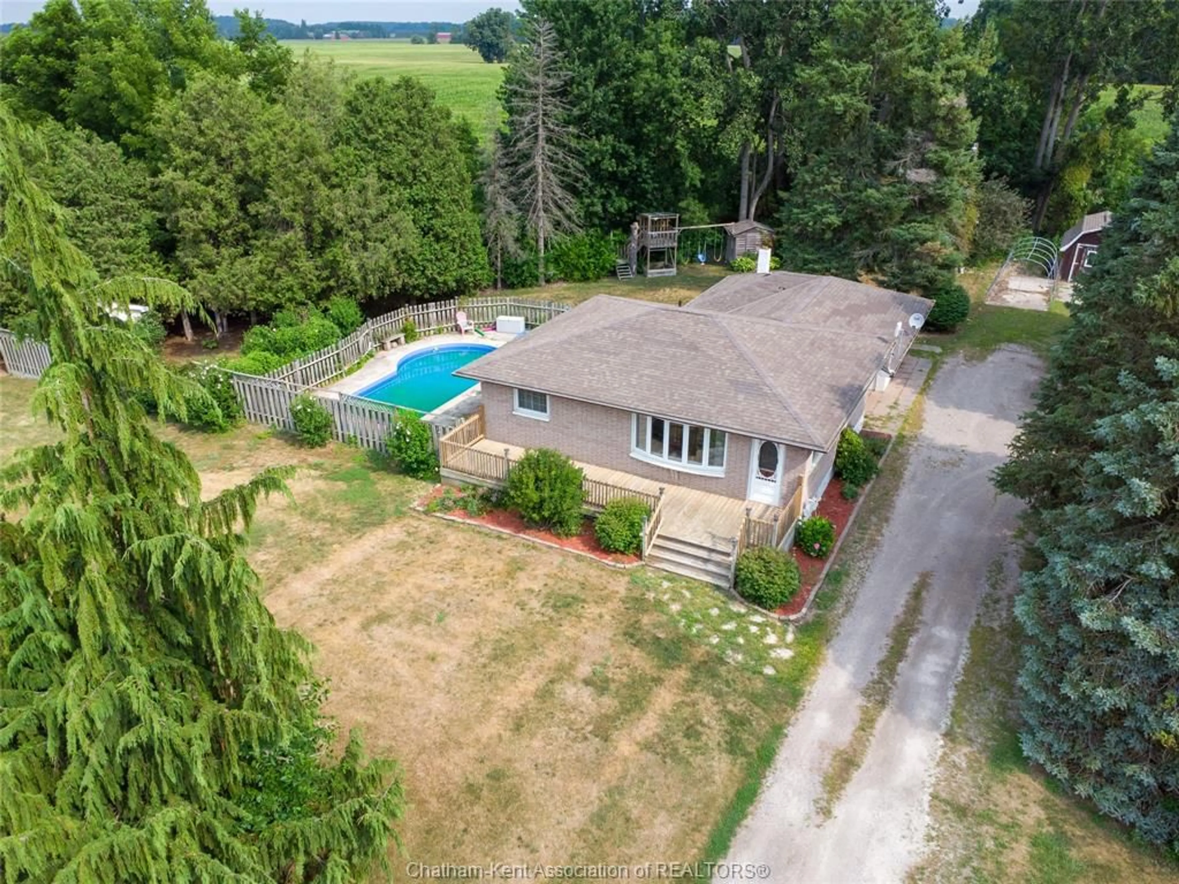 A pic from outside/outdoor area/front of a property/back of a property/a pic from drone, water/lake/river/ocean view for 12129 Baseline Rd, Thamesville Ontario N0P 2K0