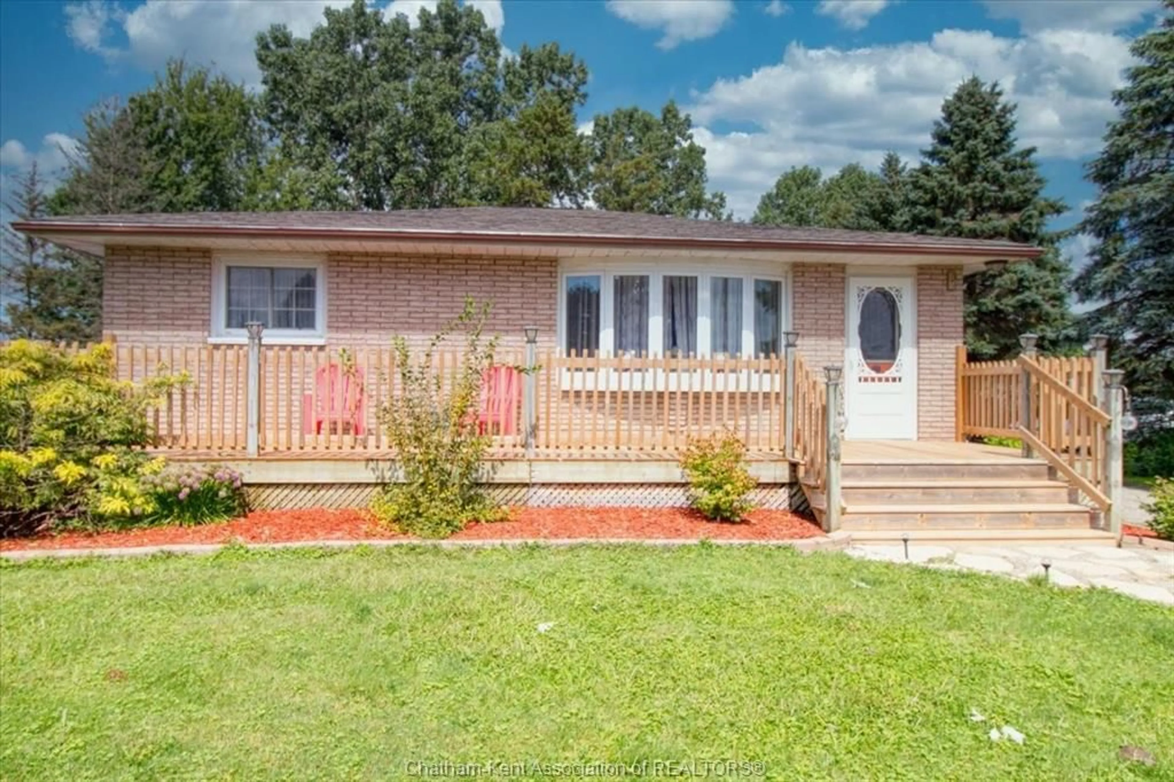 Home with vinyl exterior material, street for 12129 Baseline Rd, Thamesville Ontario N0P 2K0
