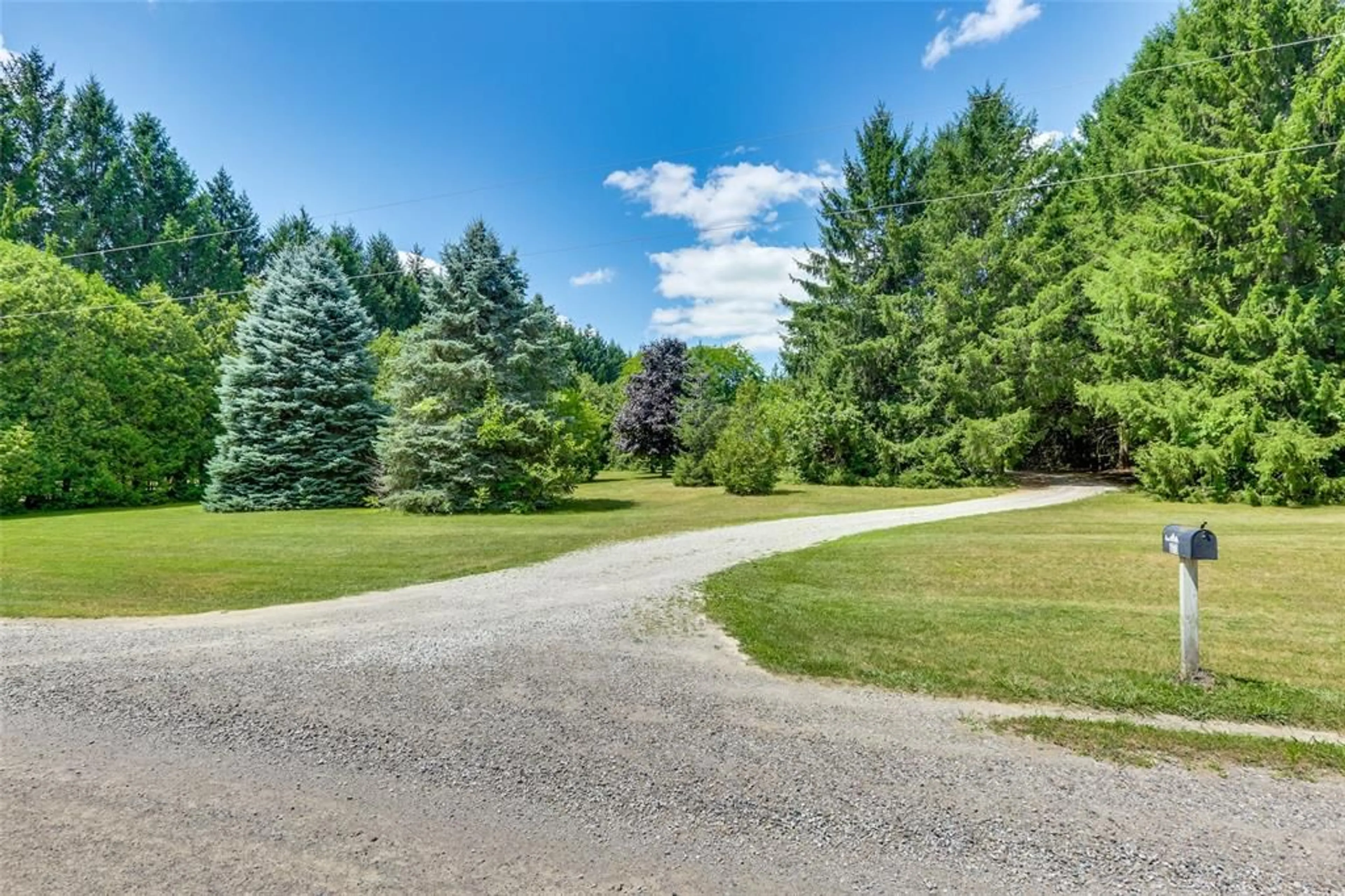 A pic from outside/outdoor area/front of a property/back of a property/a pic from drone, forest/trees view for 670 TRILLIUM Dr, Newbury Ontario N0L 1Z0