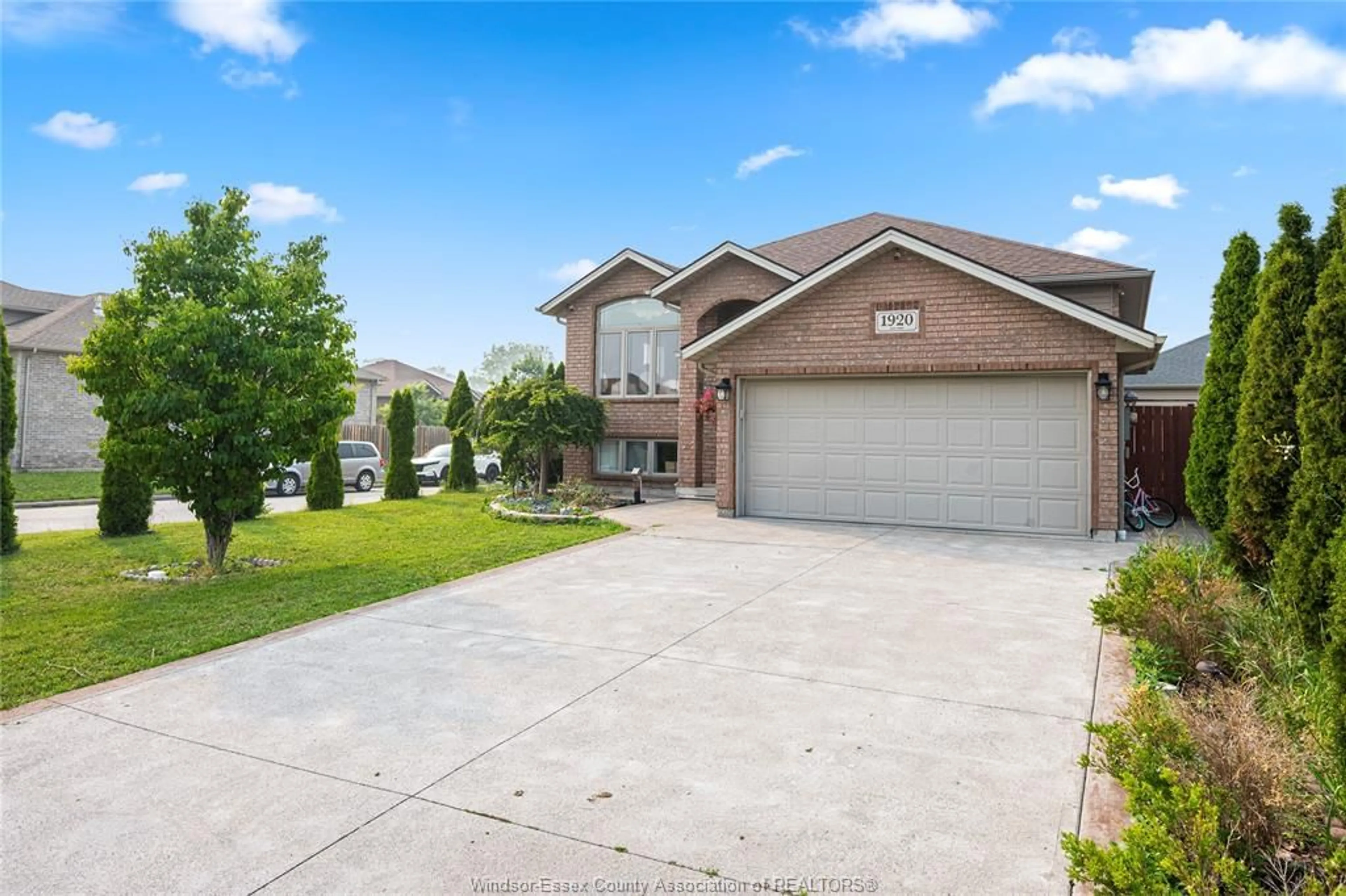 Home with brick exterior material, street for 1920 MANITOBA St, Windsor Ontario N9B 3H8