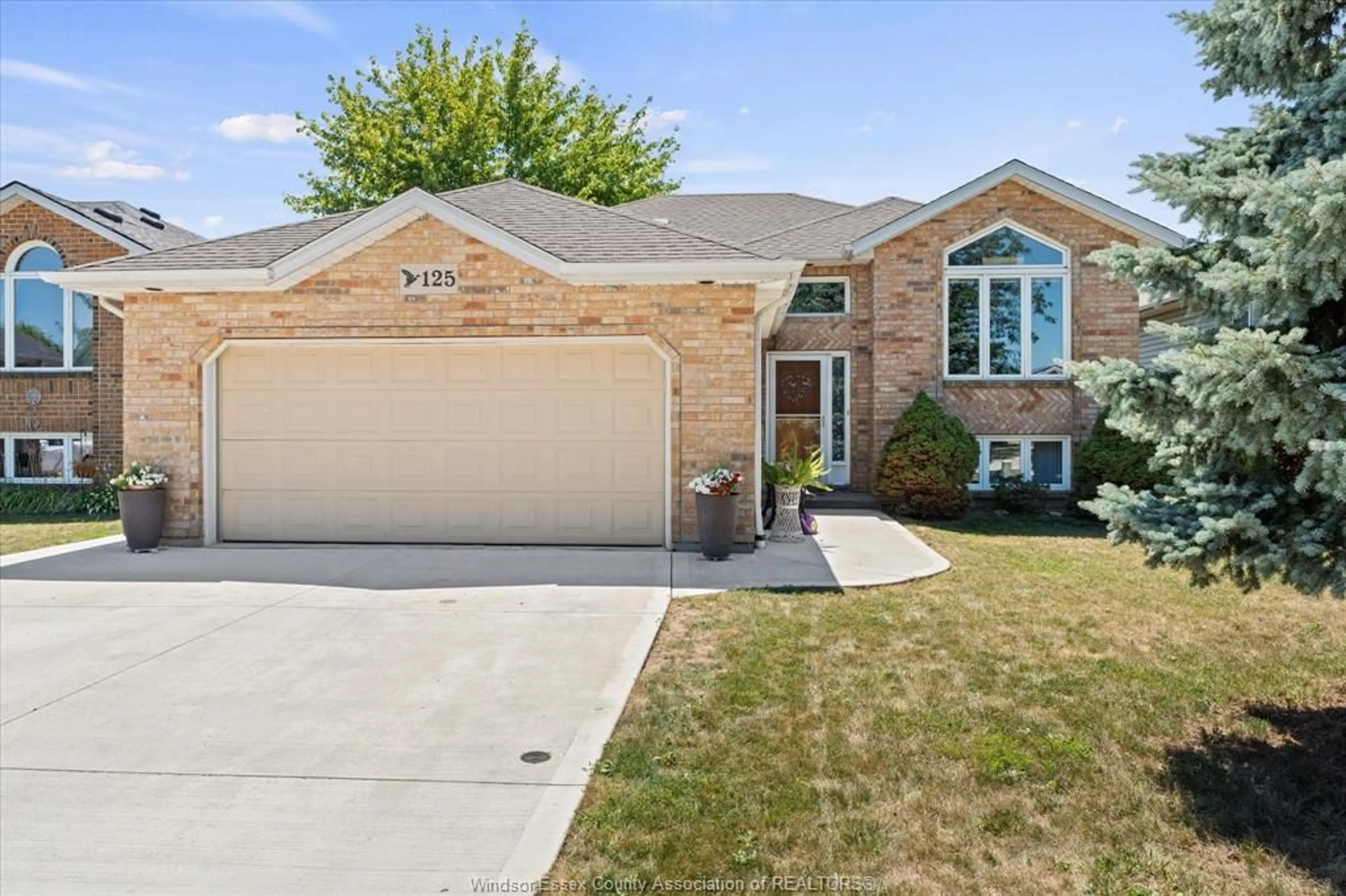 Home with brick exterior material, street for 125 MOUSSEAU, Belle River Ontario N8H 0M5
