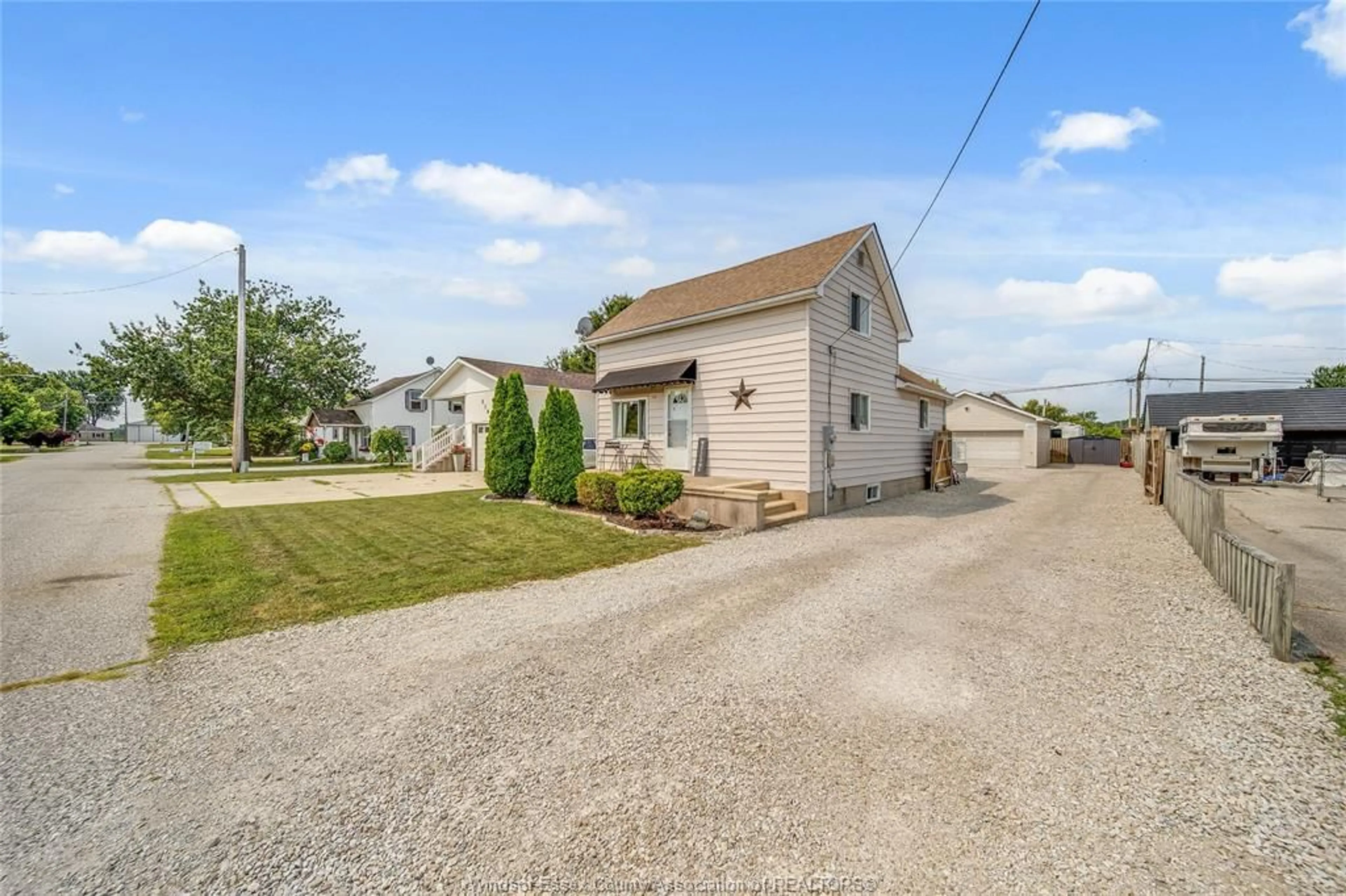 A pic from outside/outdoor area/front of a property/back of a property/a pic from drone, street for 518 ARQUETTE Ave, McGregor Ontario N0R 1J0