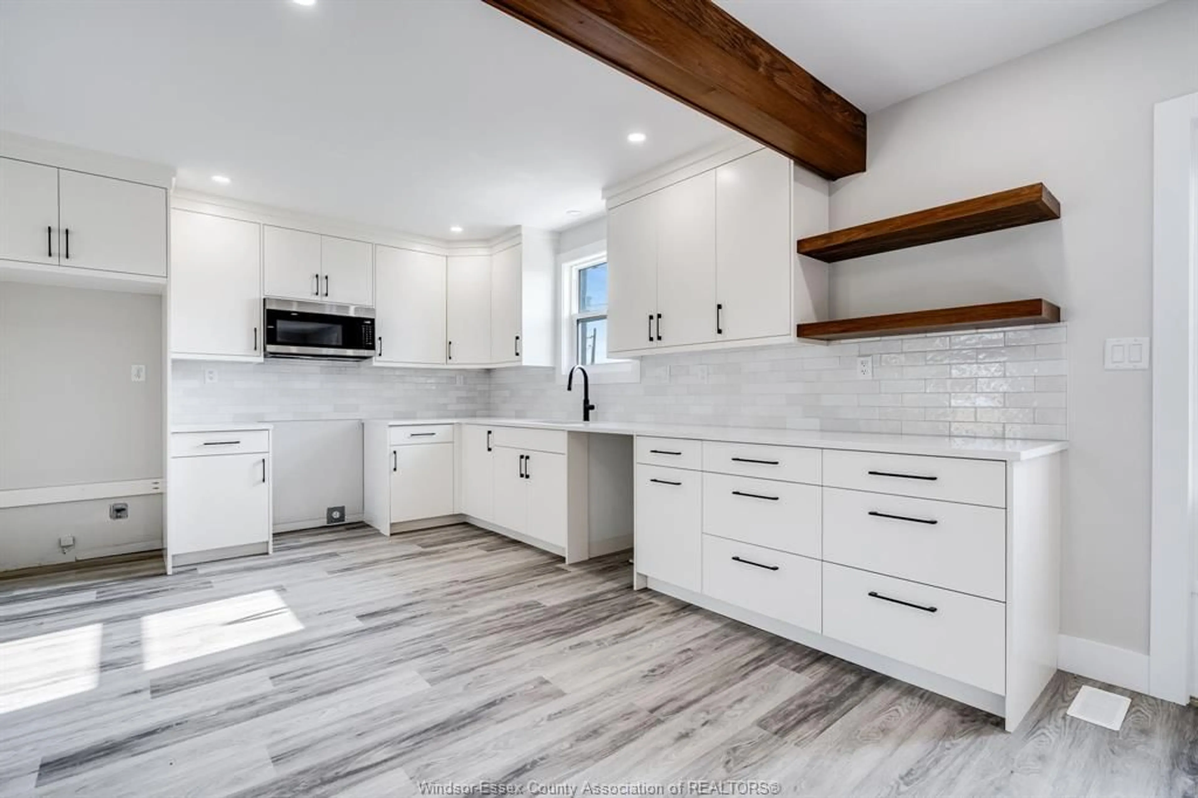 Open concept kitchen, ceramic/tile floor for 1175 HIGHWAY 77, Leamington Ontario N8H 3V8