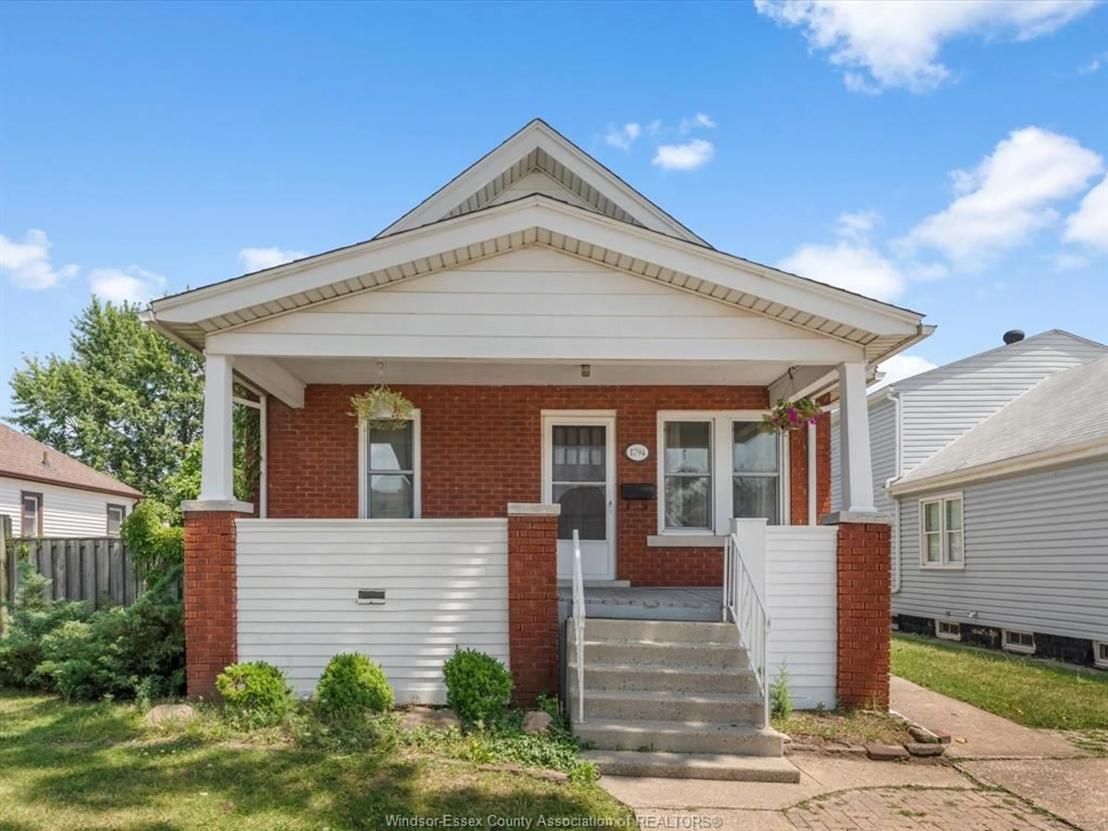 Home with brick exterior material, street for 1794 HALL Ave, Windsor Ontario N8W 2L4