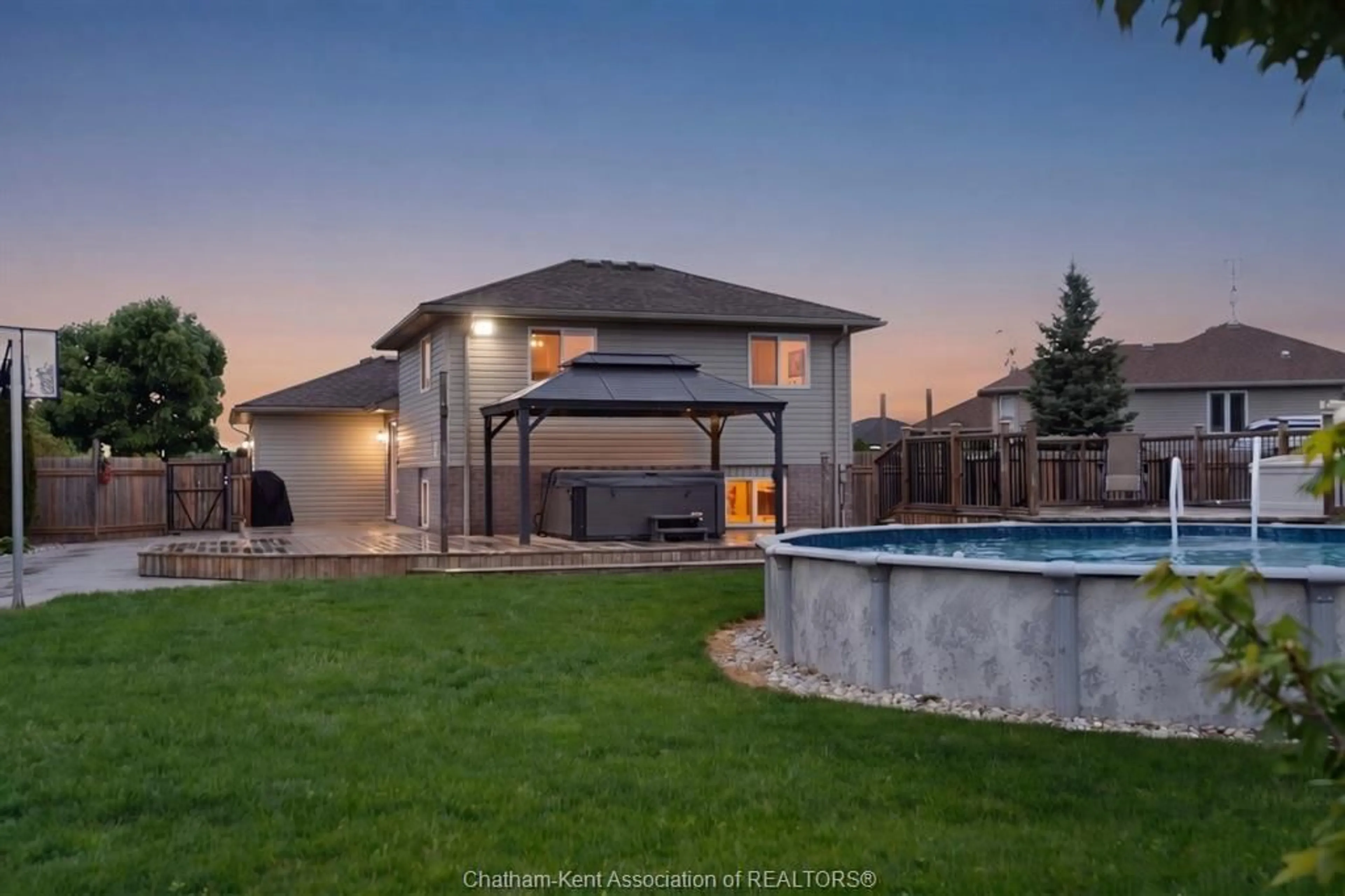 A pic from outside/outdoor area/front of a property/back of a property/a pic from drone, water/lake/river/ocean view for 67 Azar Ave, Tilbury Ontario N0P 2L0
