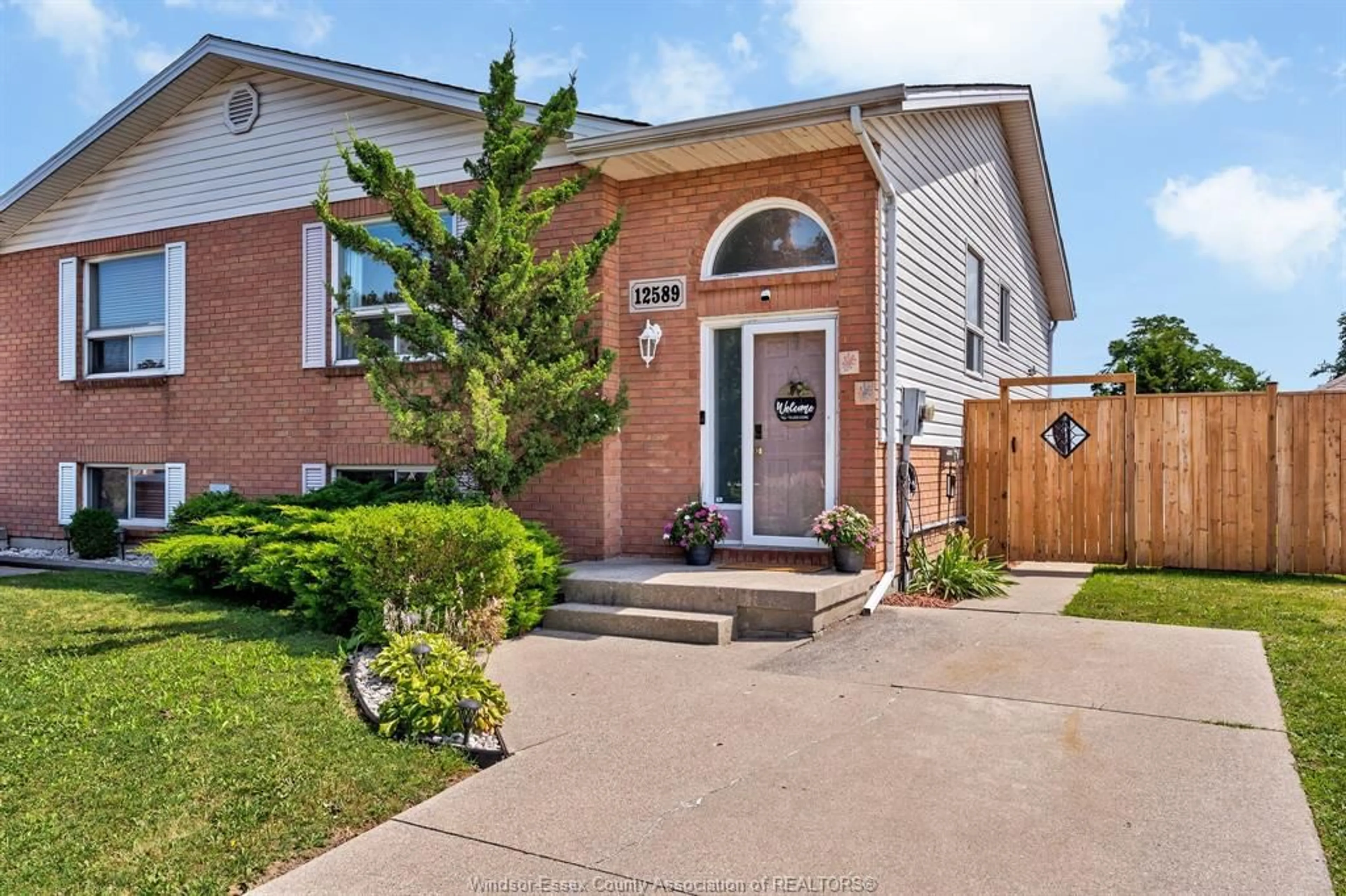 Home with brick exterior material, street for 12589 HORWOOD Cres, Tecumseh Ontario N8N 4T7