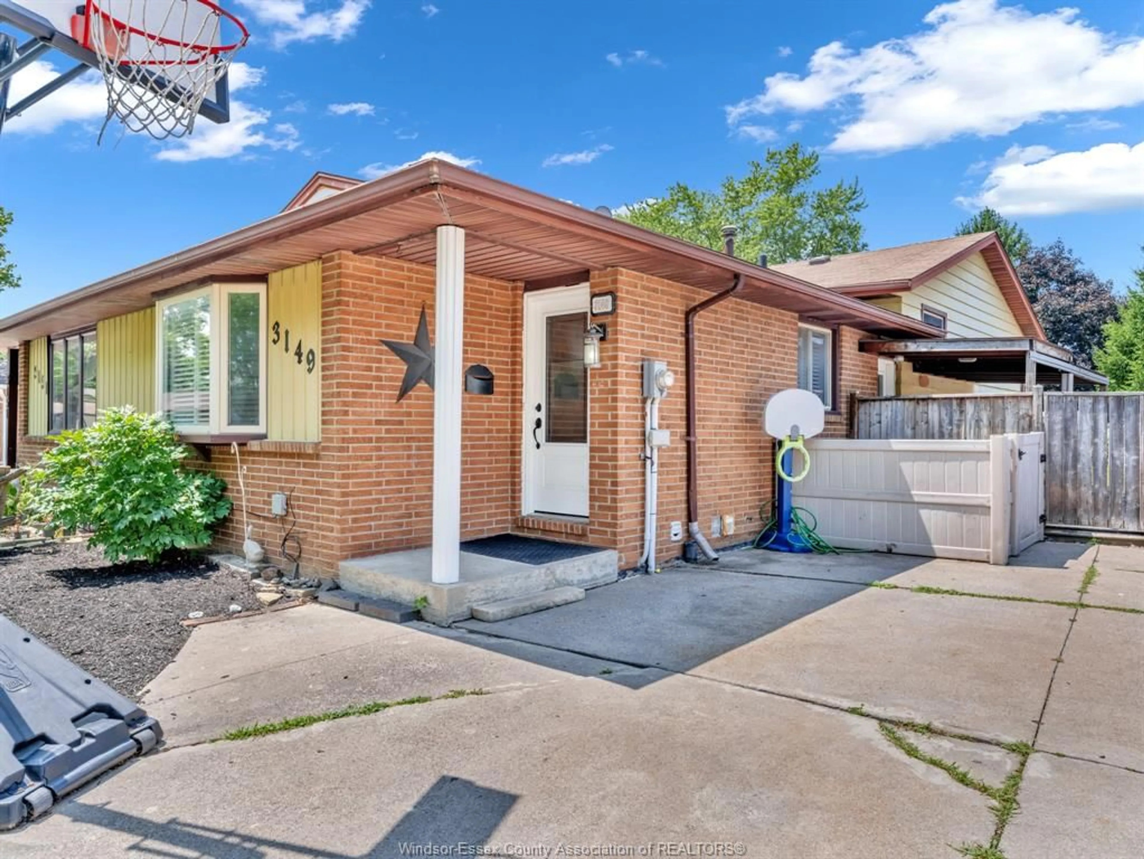 Home with brick exterior material, street for 3149 ELMWOOD Cres, Windsor Ontario N8R 1X5