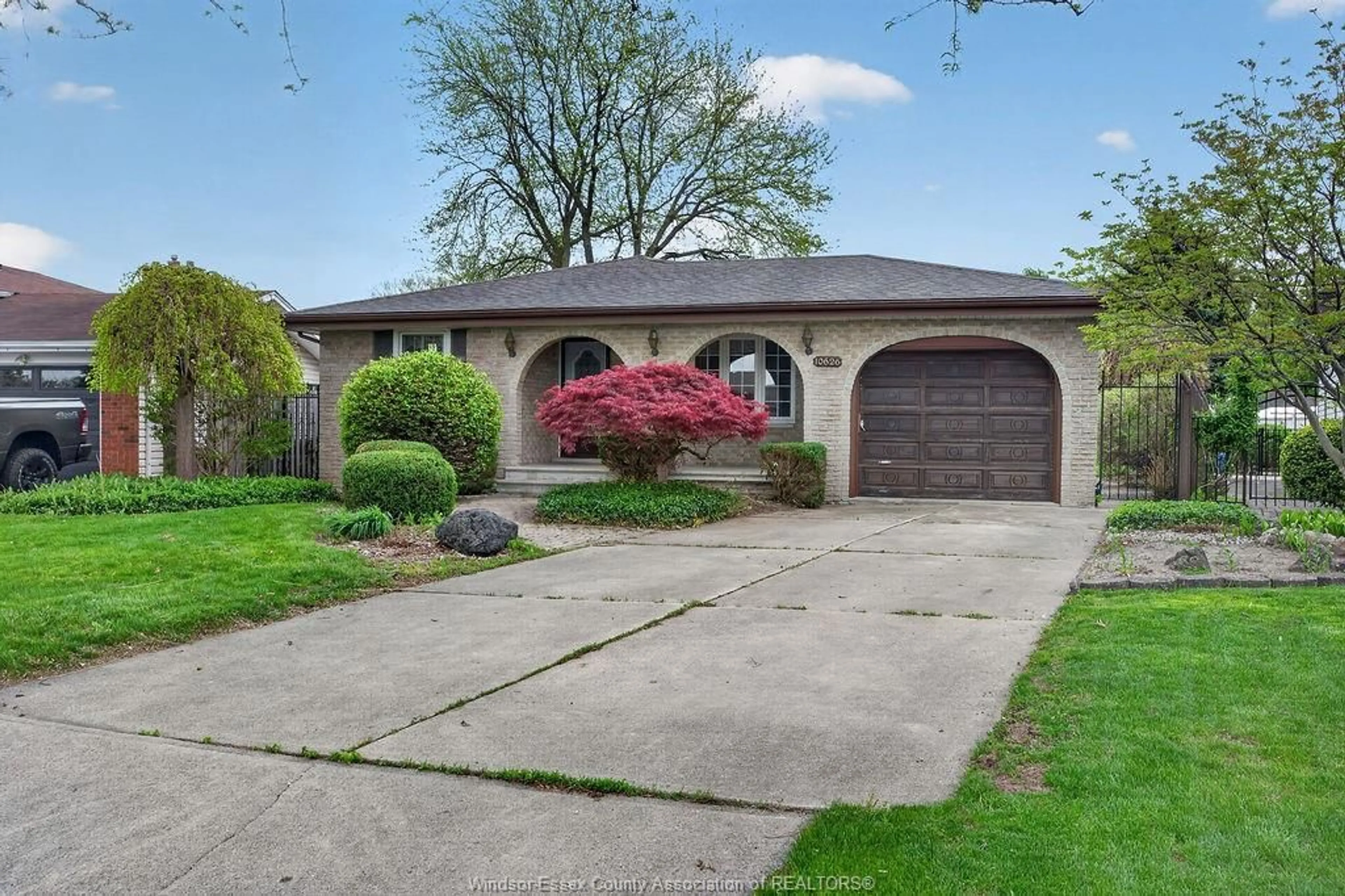 Home with brick exterior material, street for 10626 Keating Cresent, Windsor Ontario N8R 1T5