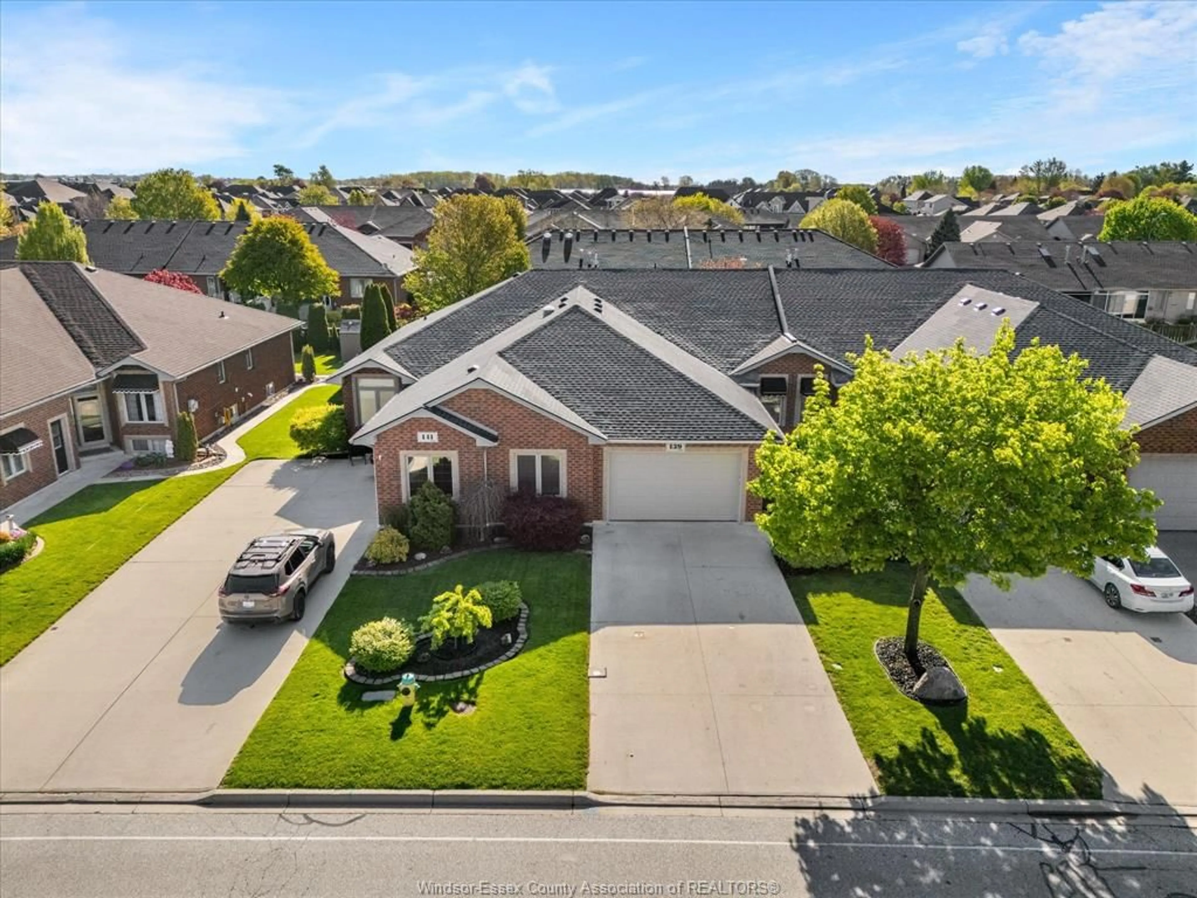 A pic from outside/outdoor area/front of a property/back of a property/a pic from drone, street for 139 Woodycrest Ave, Kingsville Ontario N9Y 4G3