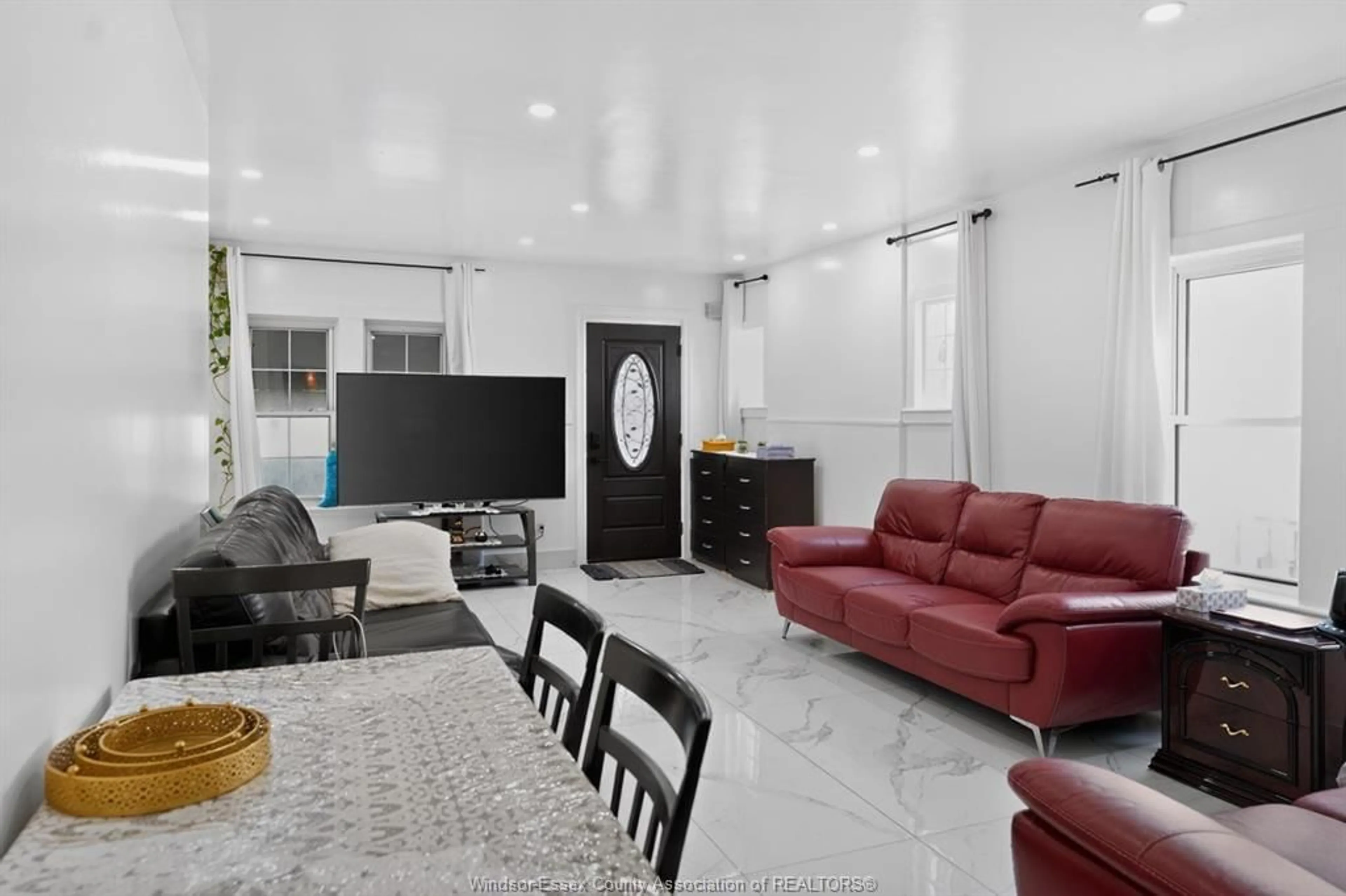 Living room with furniture, ceramic/tile floor for 852 REEDMERE, Windsor Ontario N8S 2L7