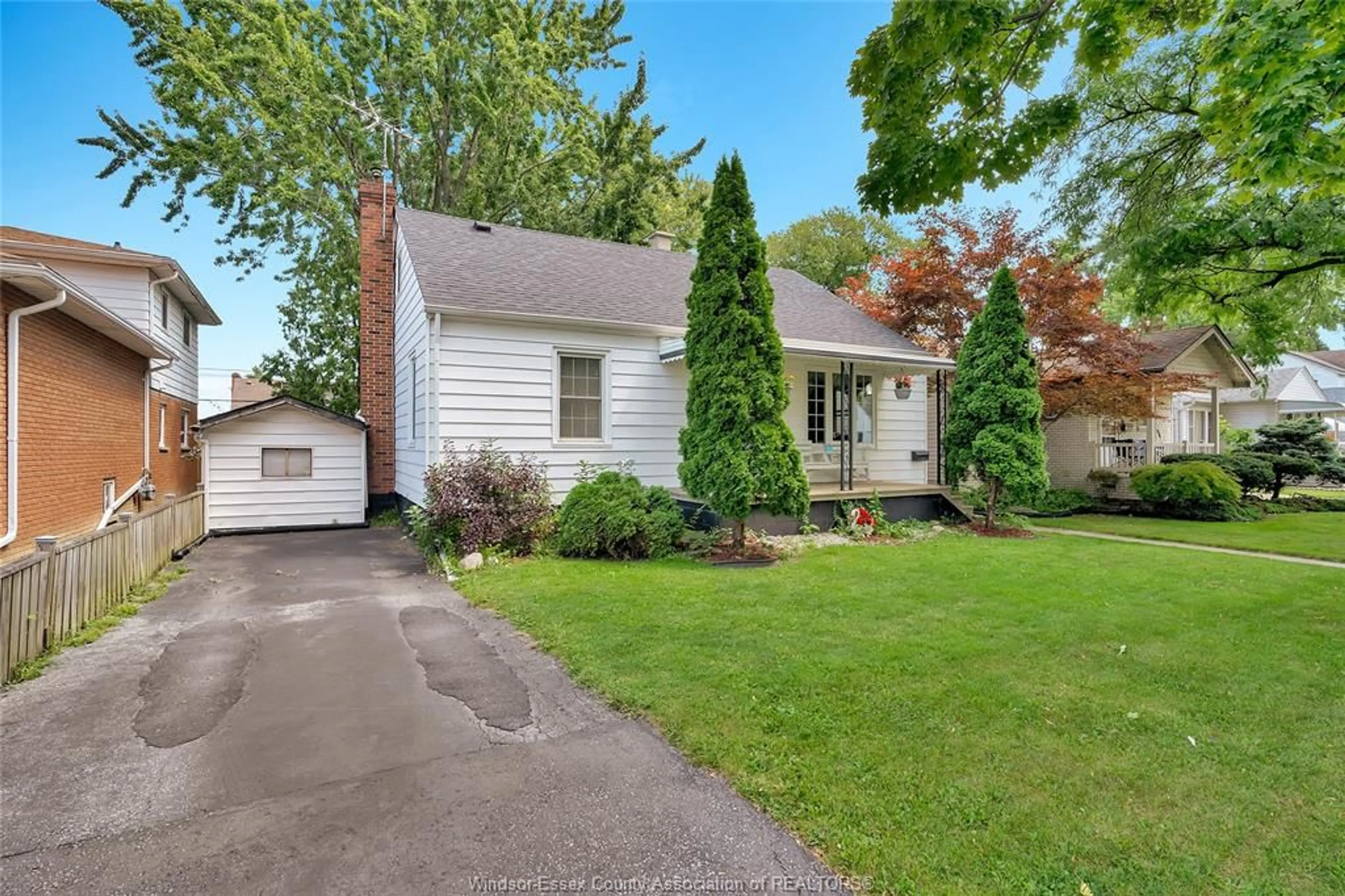 Home with vinyl exterior material, street for 1418 PILLETTE Rd, Windsor Ontario N8Y 3B9